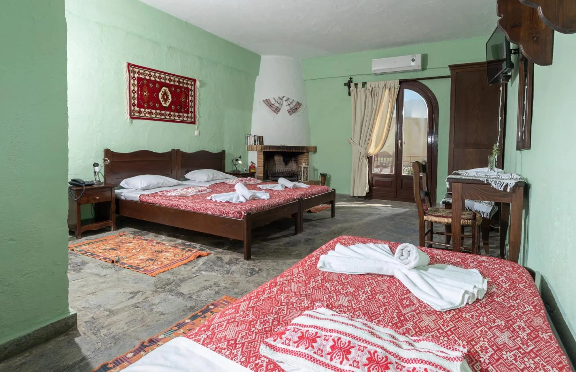 Bed in Arolithos Traditional Village Hotel