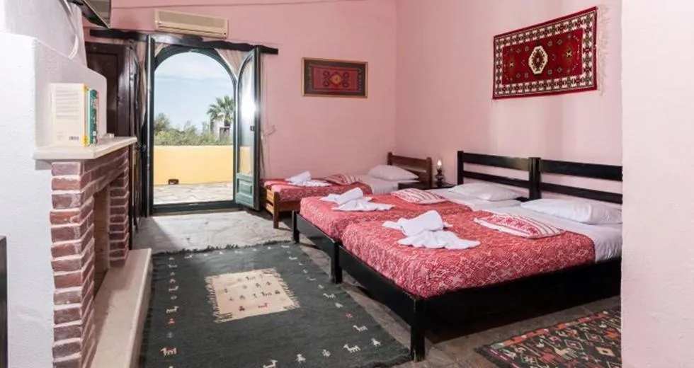 Bed in Arolithos Traditional Village Hotel