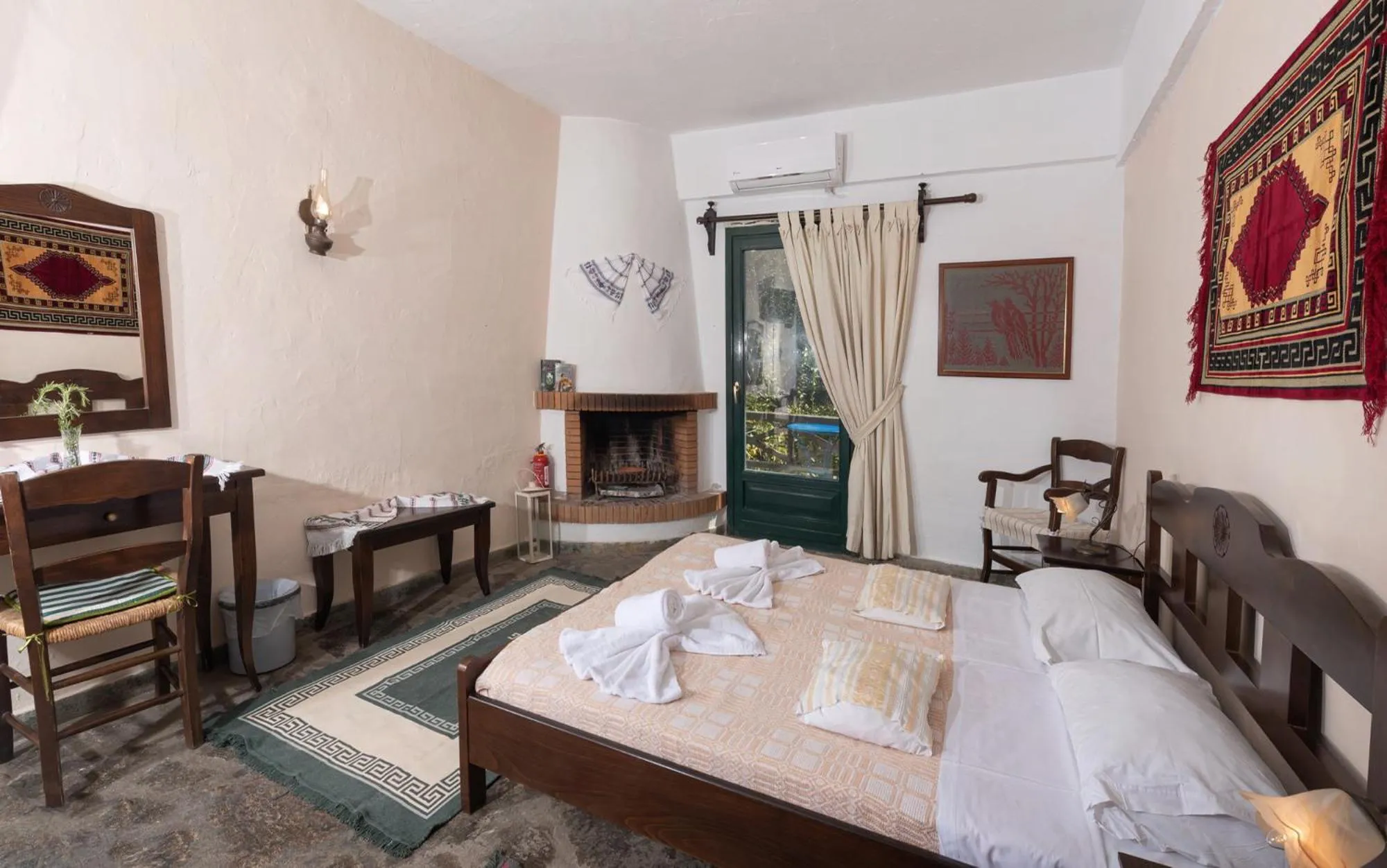 Bed in Arolithos Traditional Village Hotel