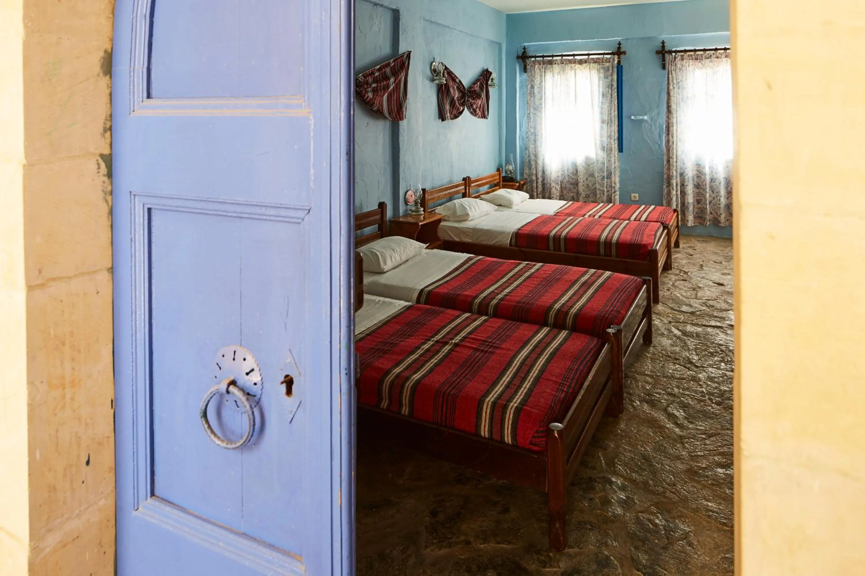 Bedroom, Bed in Arolithos Traditional Village Hotel