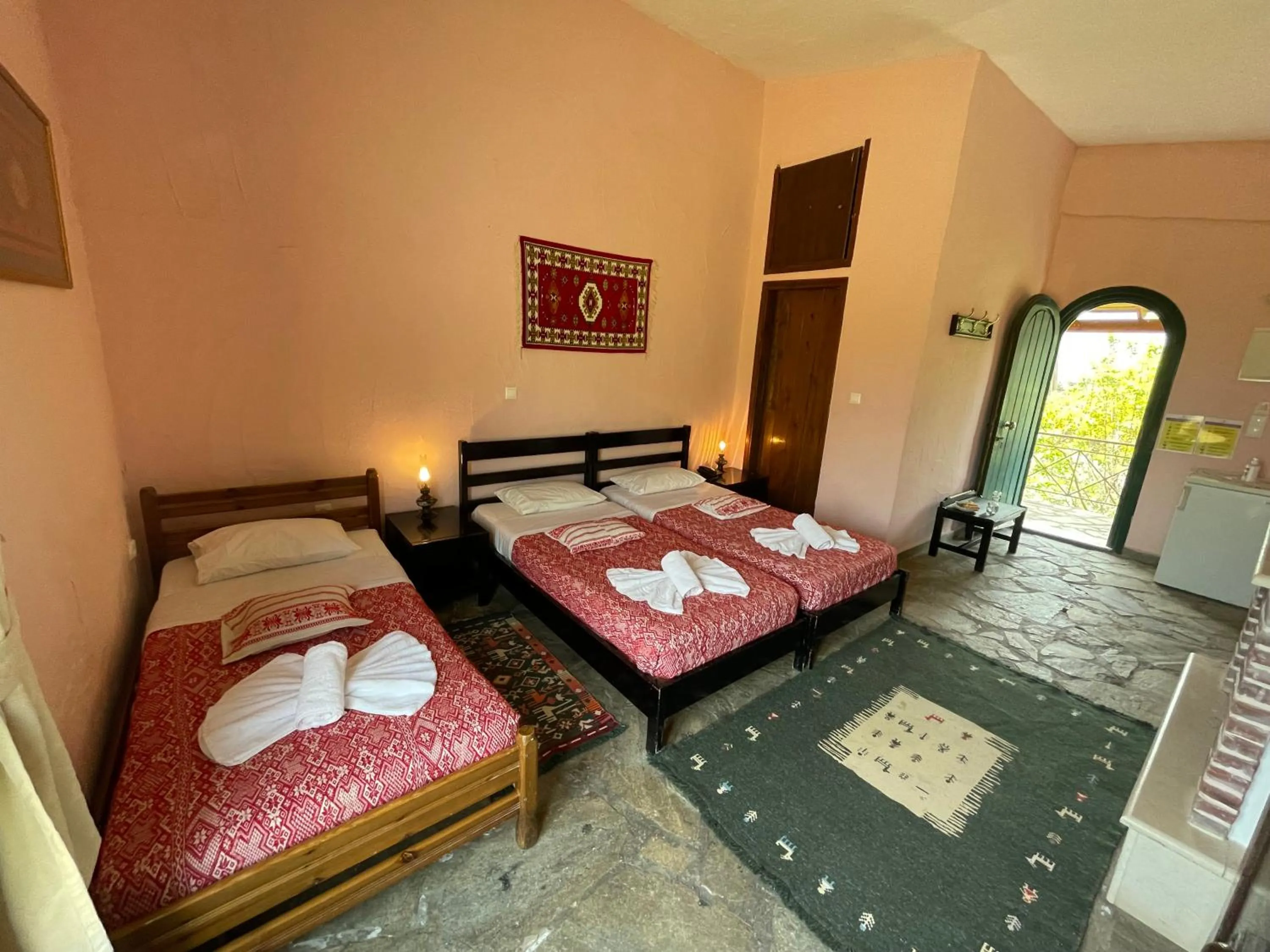 Bed in Arolithos Traditional Village Hotel
