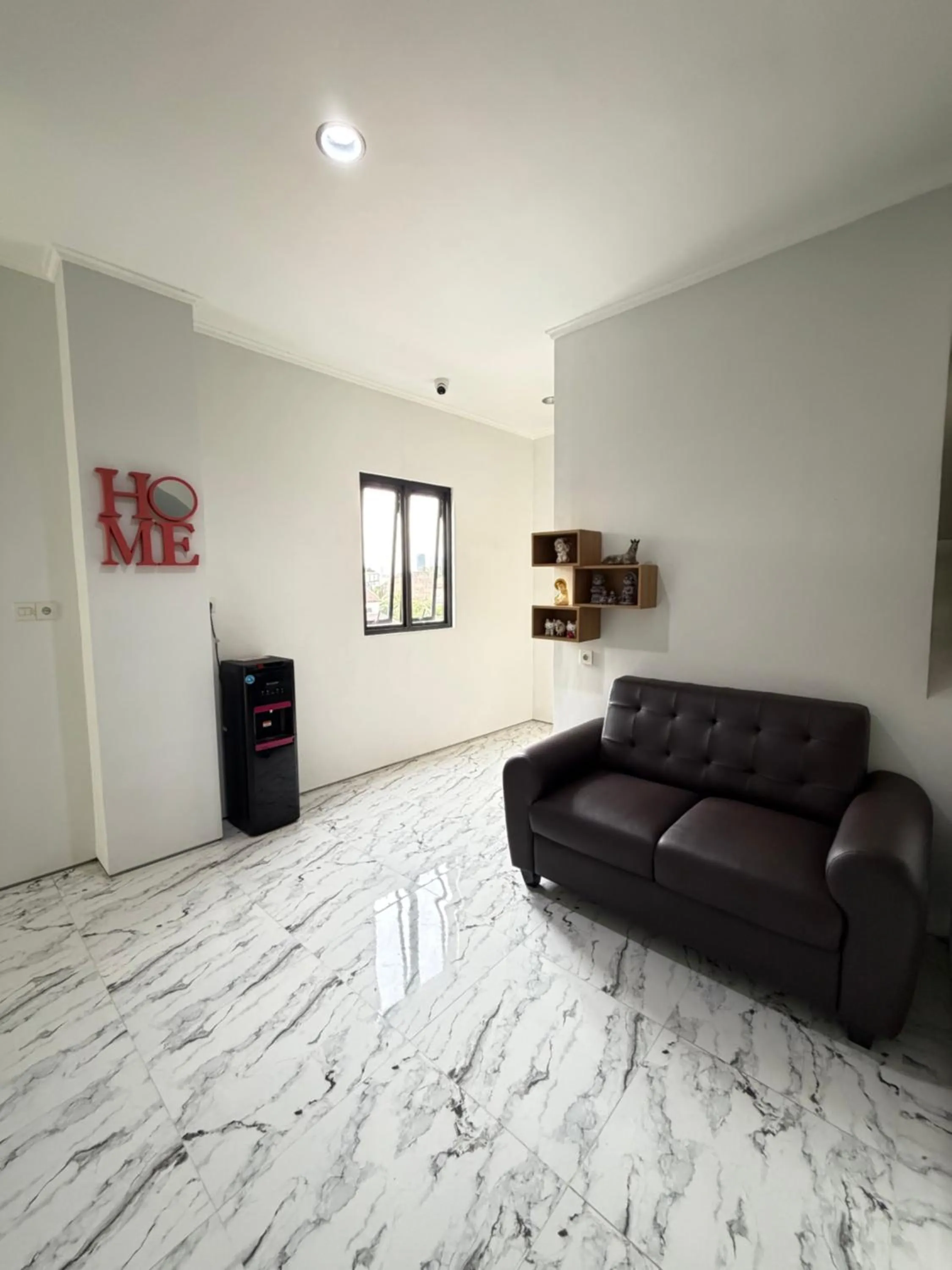 Seating area in Aurora House Surabaya