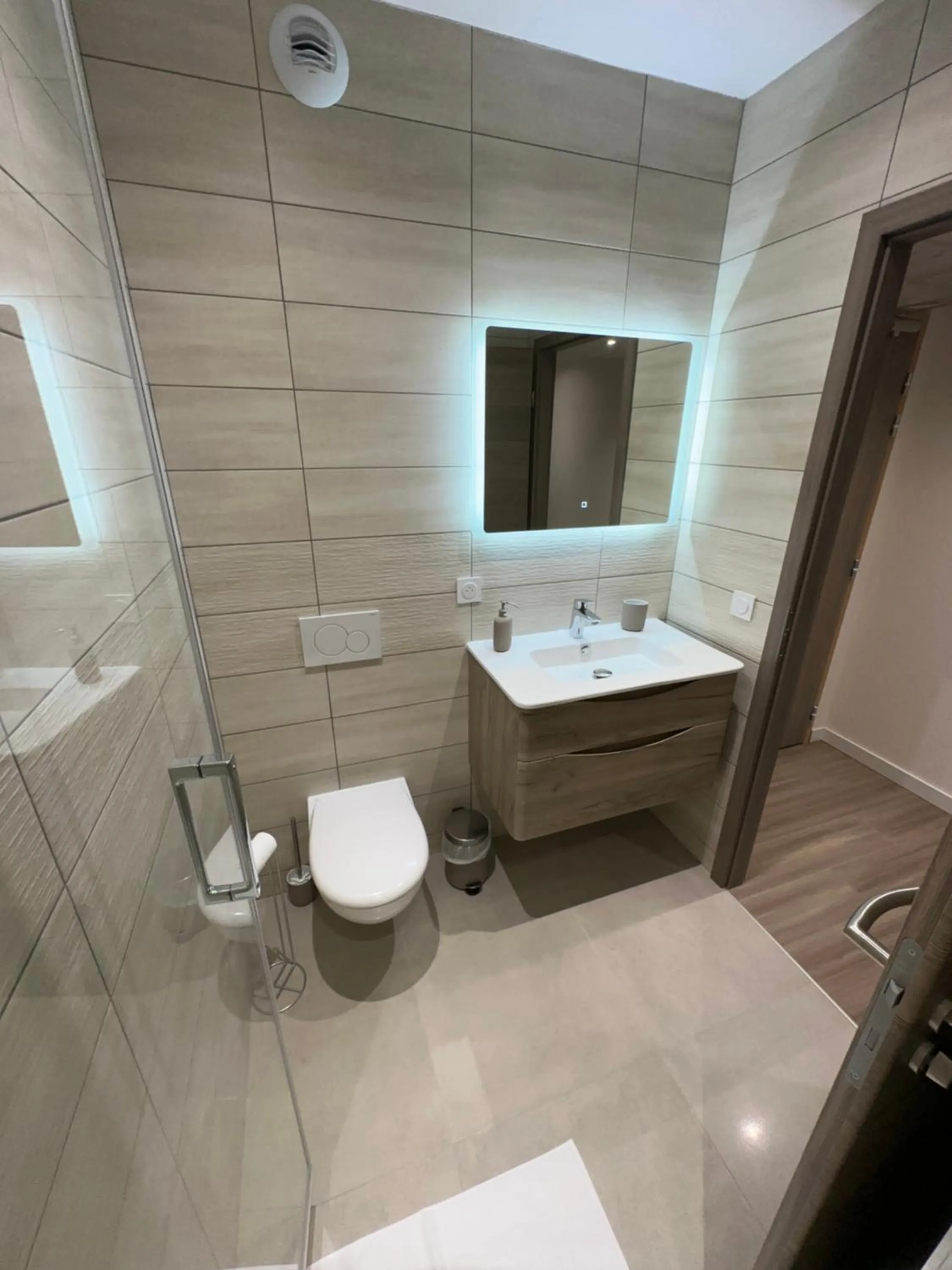 Toilet in Musieges Appart'Hôtel