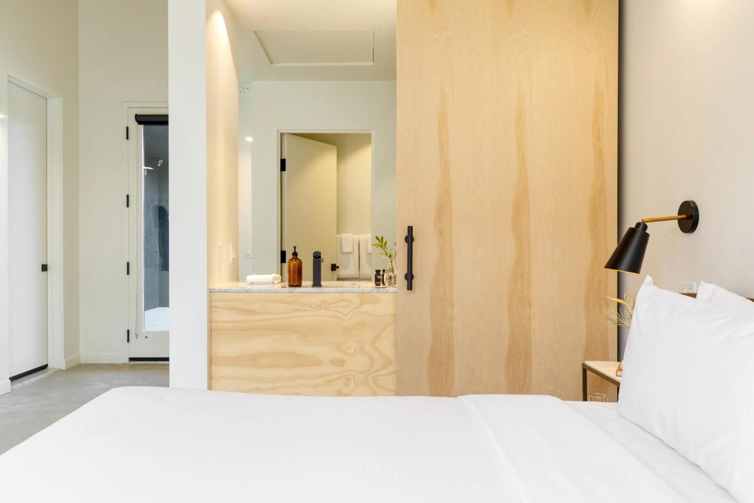 Bed in Blackhaus Suites by AvantStay Modern Comfort in Downtown Palm Springs