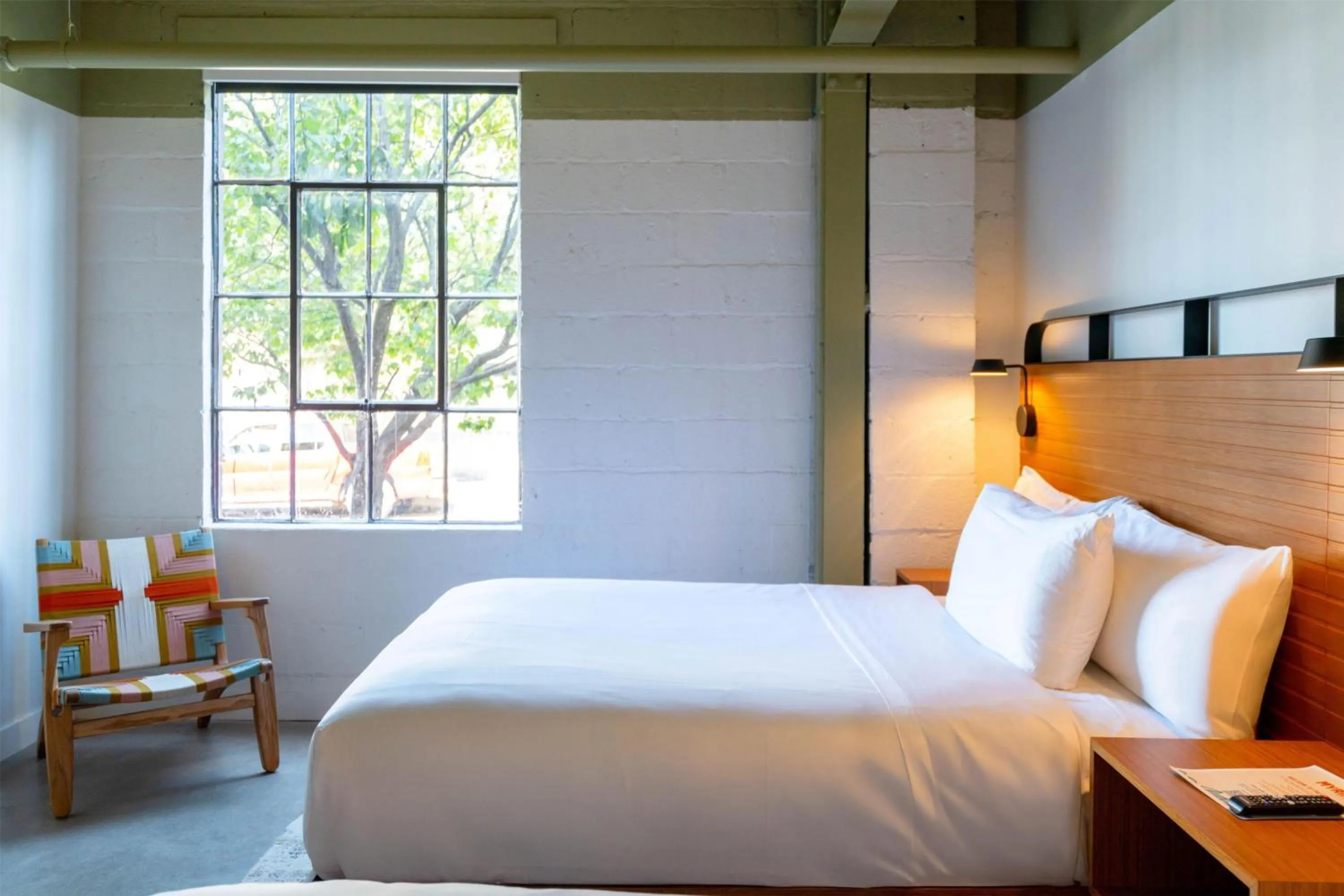 Bed in The Myriad Hotel Louisville, Tapestry Collection by Hilton