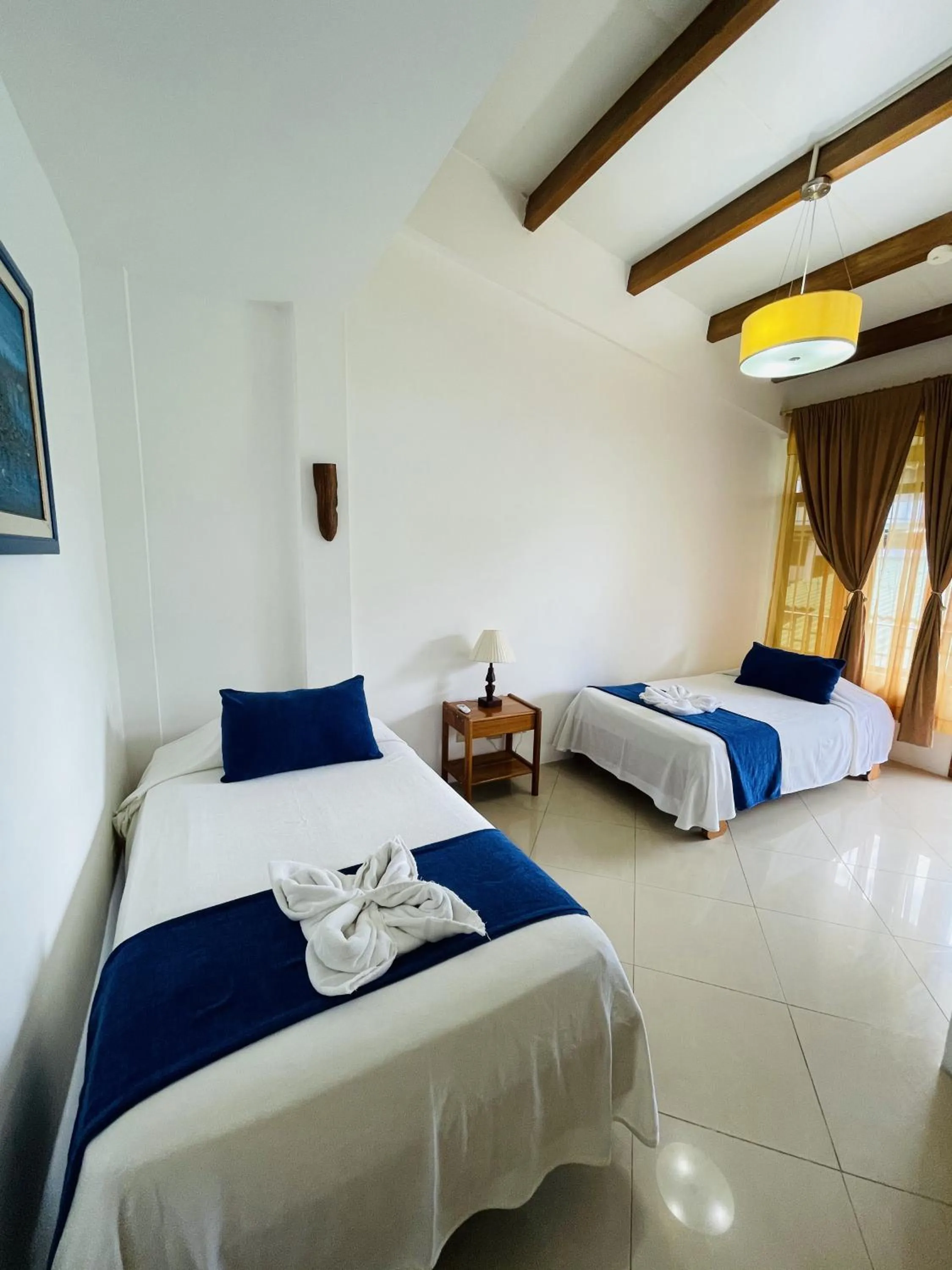 Photo of the whole room, Bed in Fernandina Hotel & Spa