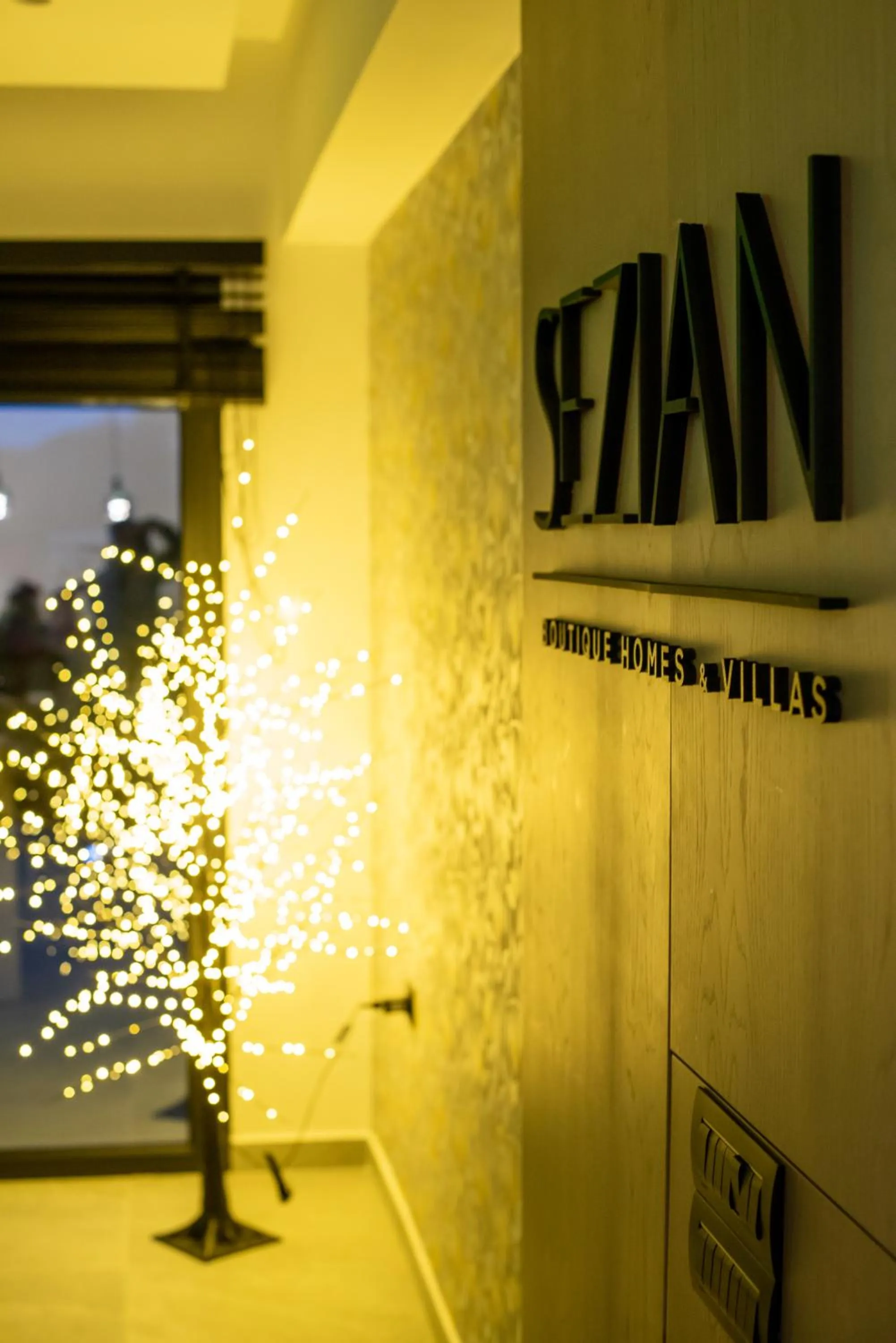 Property logo or sign in Sezian Boutique Homes and Villas