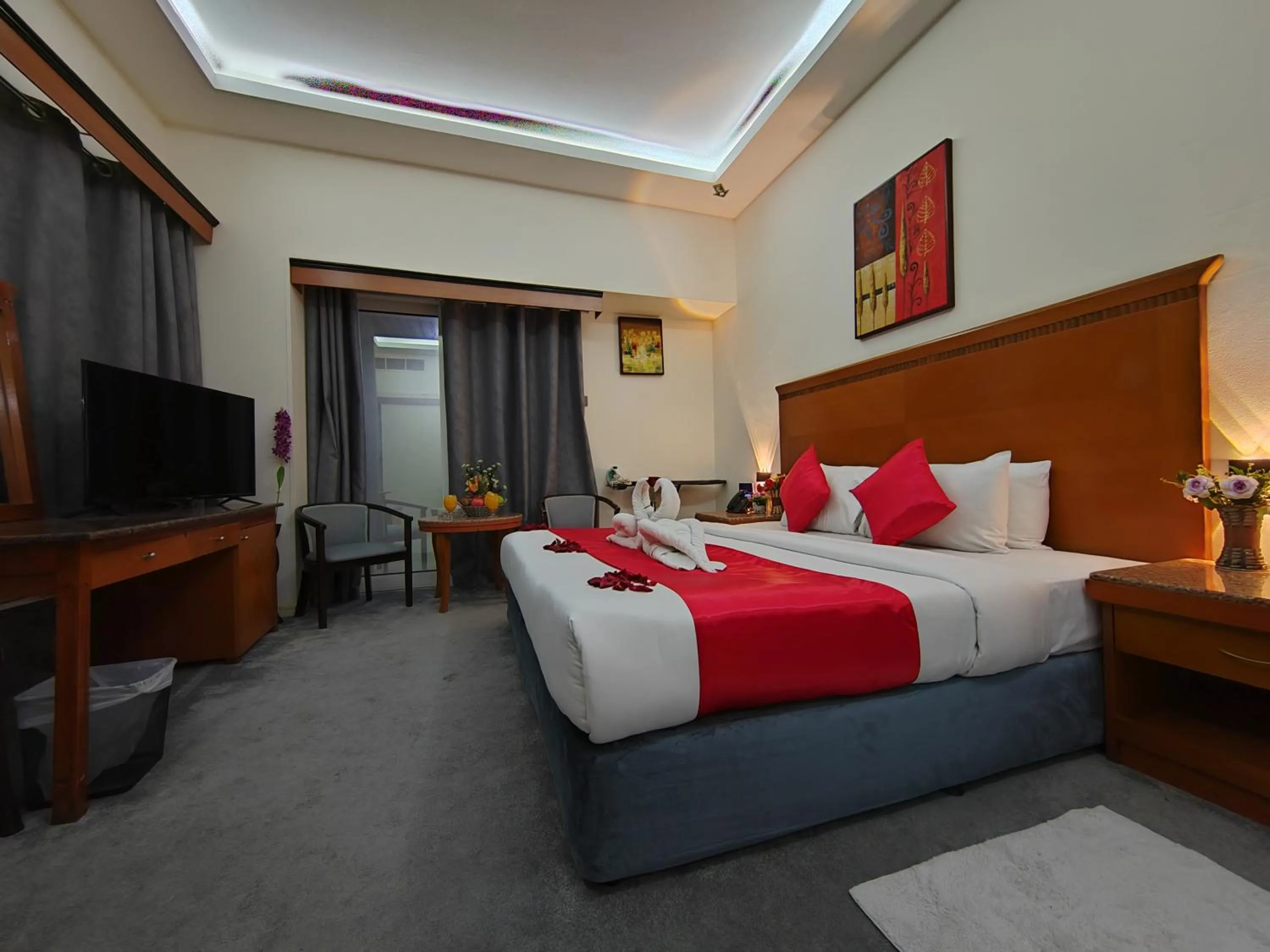 Communal lounge/ TV room, Bed in Le Paradise Palace Hotel Deira Dubai Al Rigga