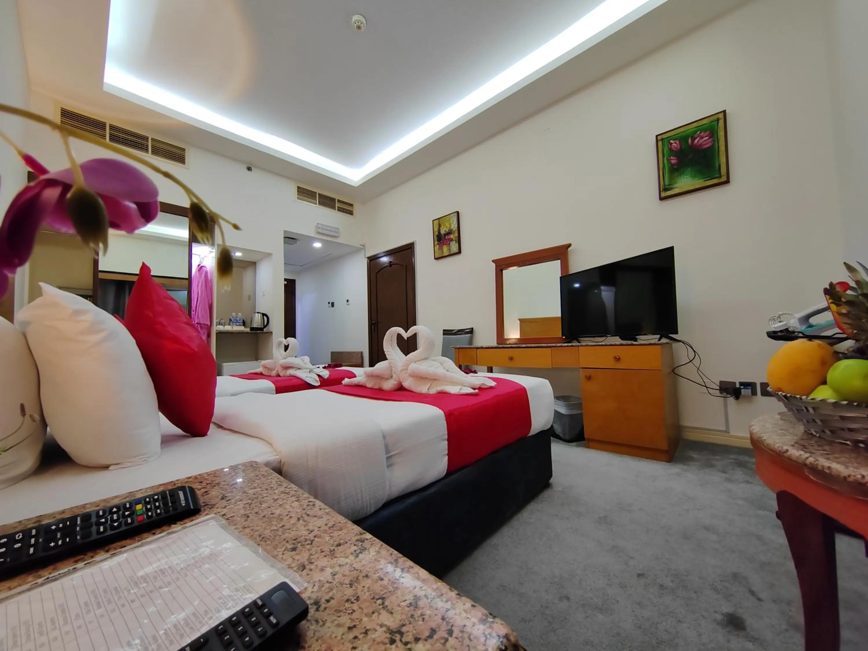 Communal lounge/ TV room, Bed in Le Paradise Palace Hotel Deira Dubai Al Rigga