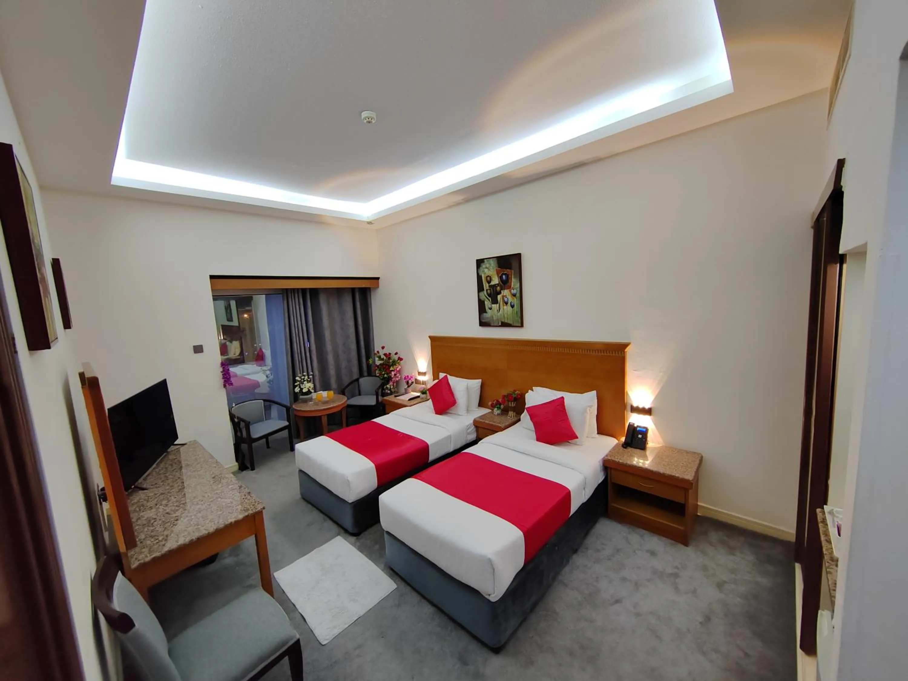 Communal lounge/ TV room, Bed in Le Paradise Palace Hotel Deira Dubai Al Rigga