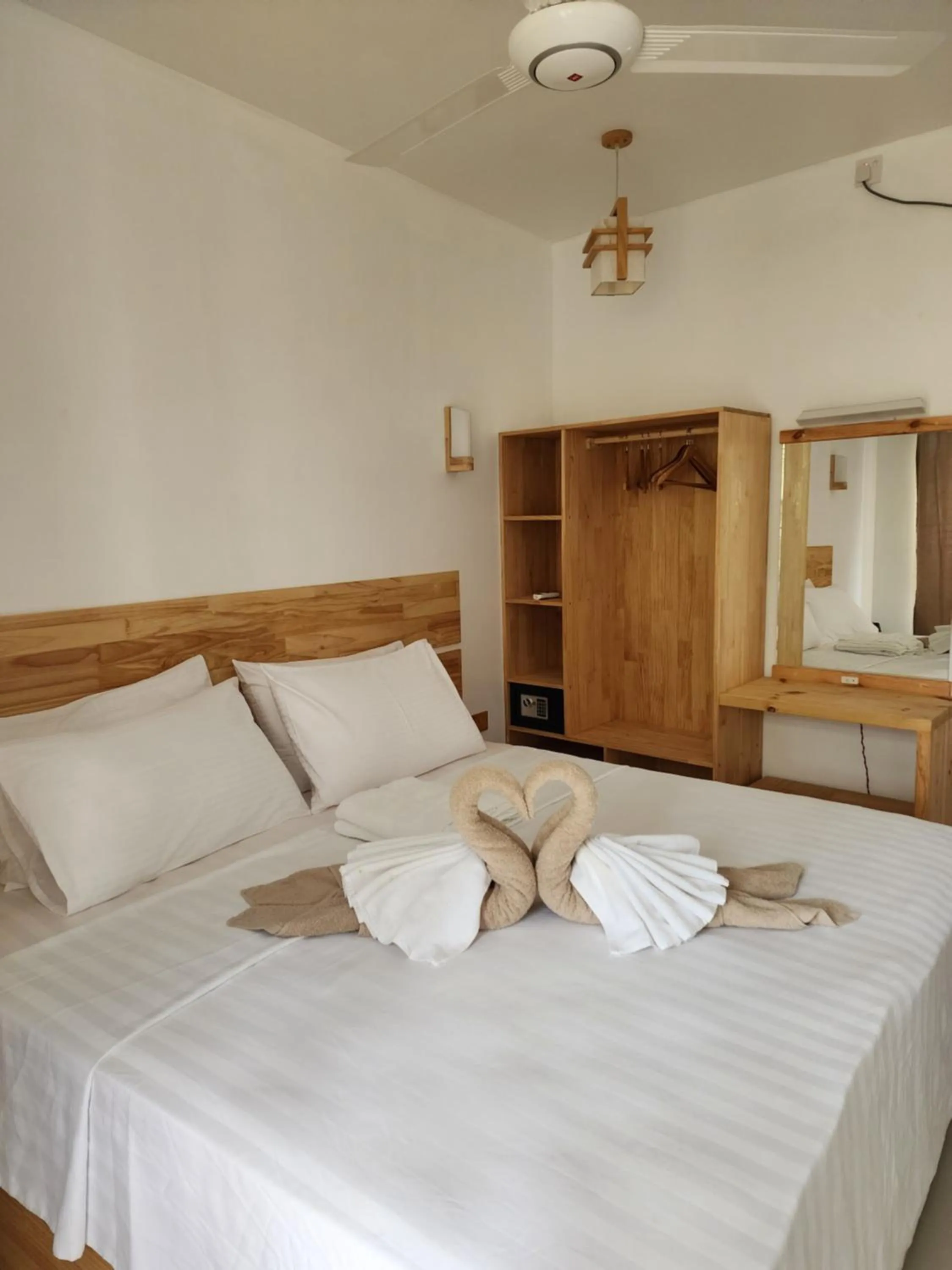 Photo of the whole room, Bed in Dhigurah Dhonveli Boutique