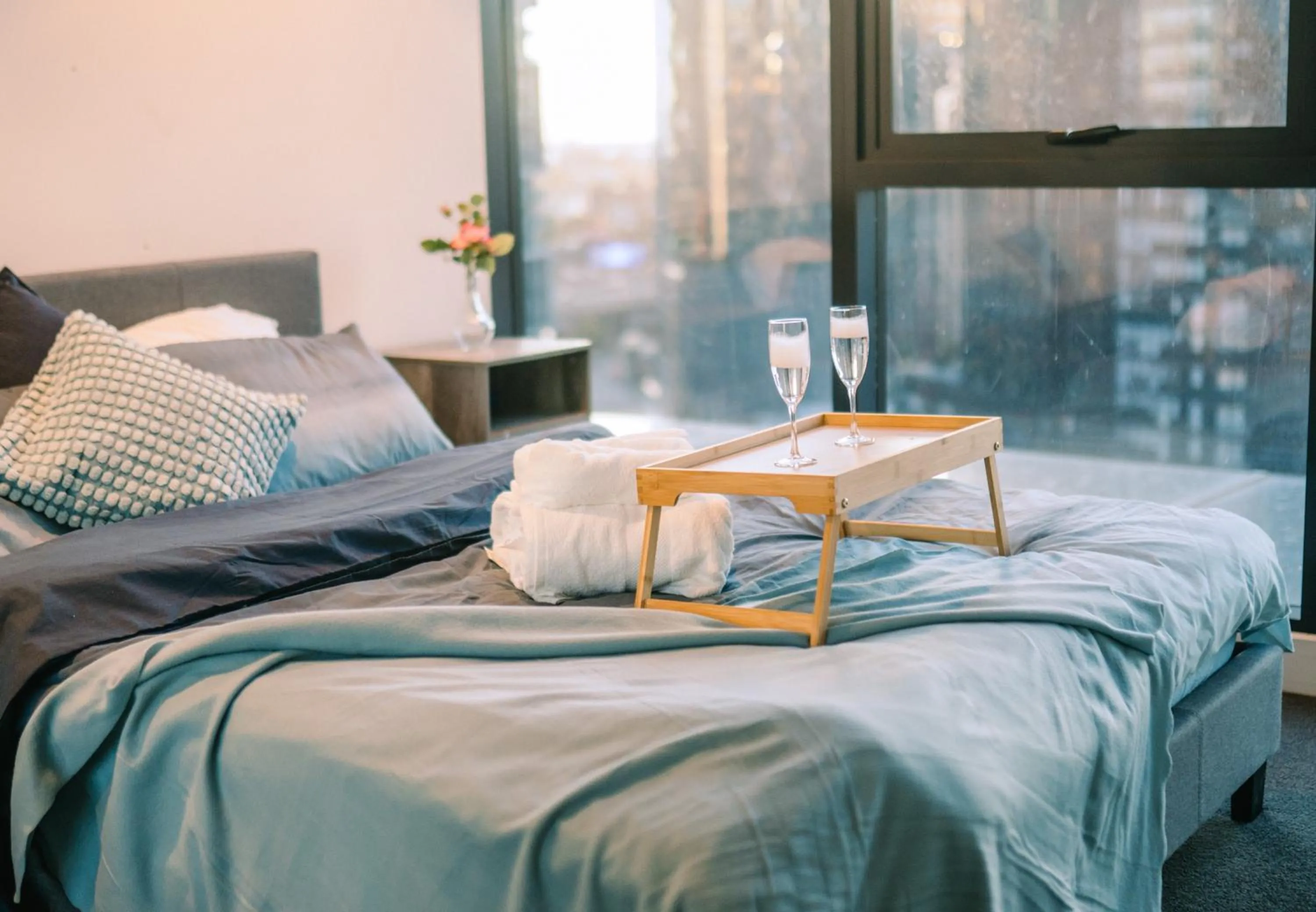 Bed in Southbank Serenity 2BR, Parking, and Wi-Fi