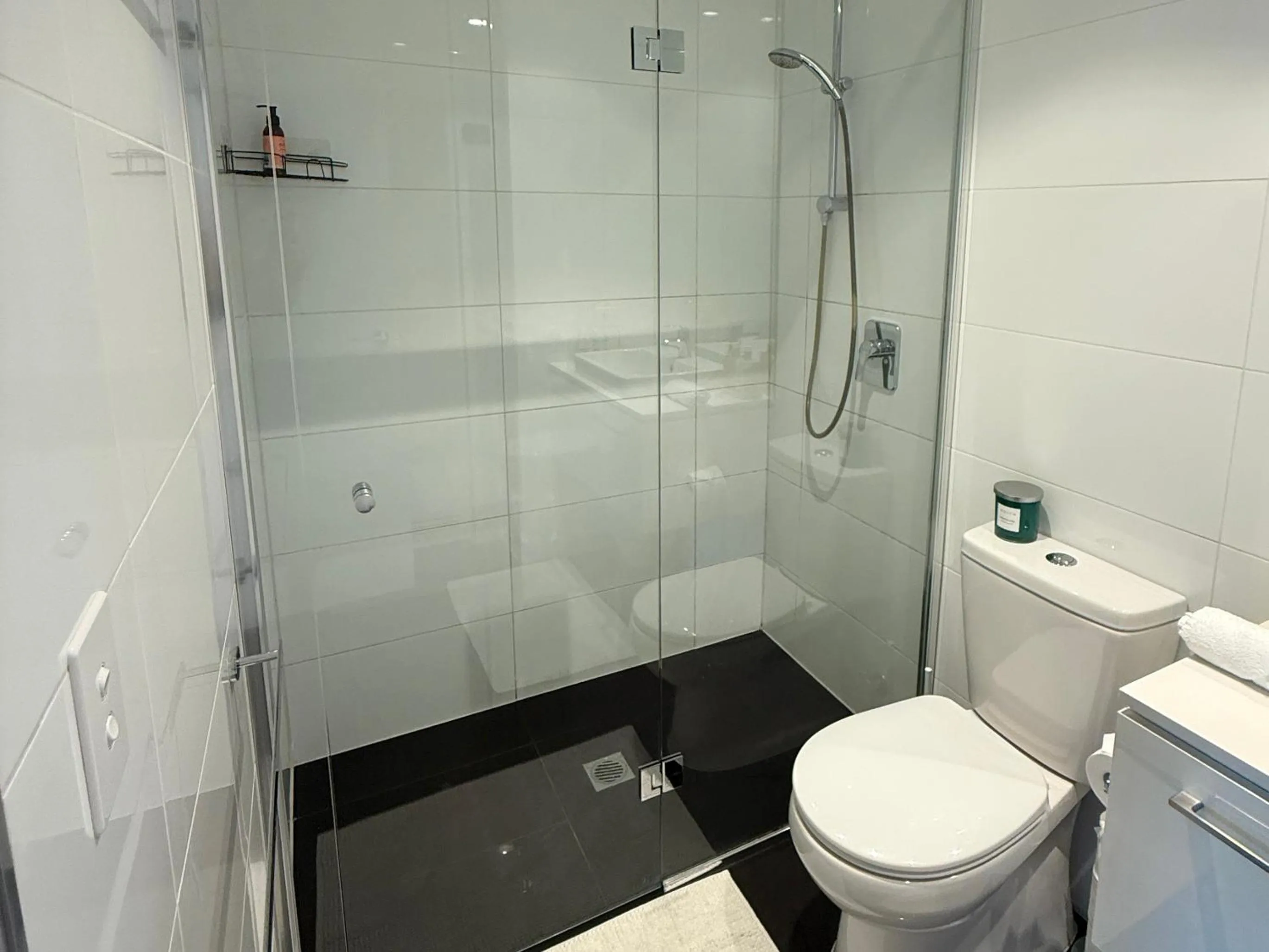 Shower in Southbank Serenity 2BR, Parking, and Wi-Fi
