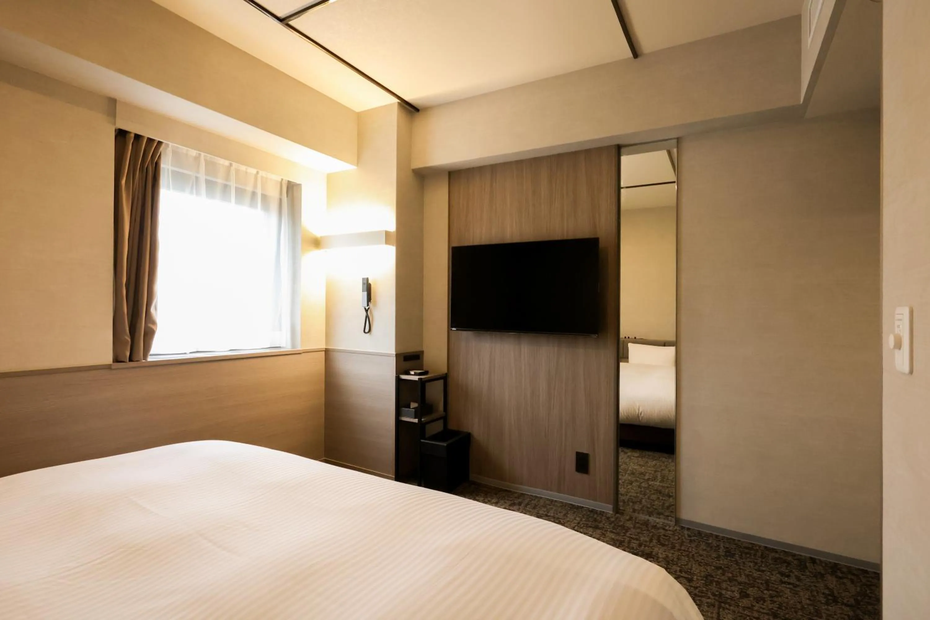 Photo of the whole room, Bed in SK HOTEL Kobe Ekimae