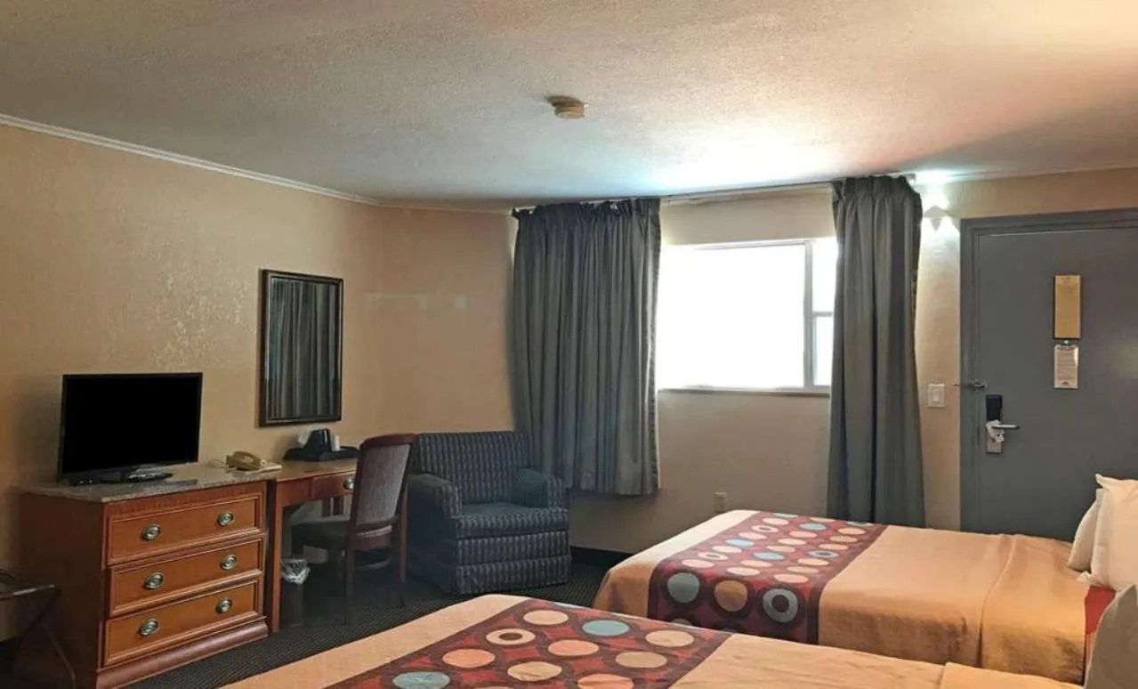 Bed in Happy Stay Inn