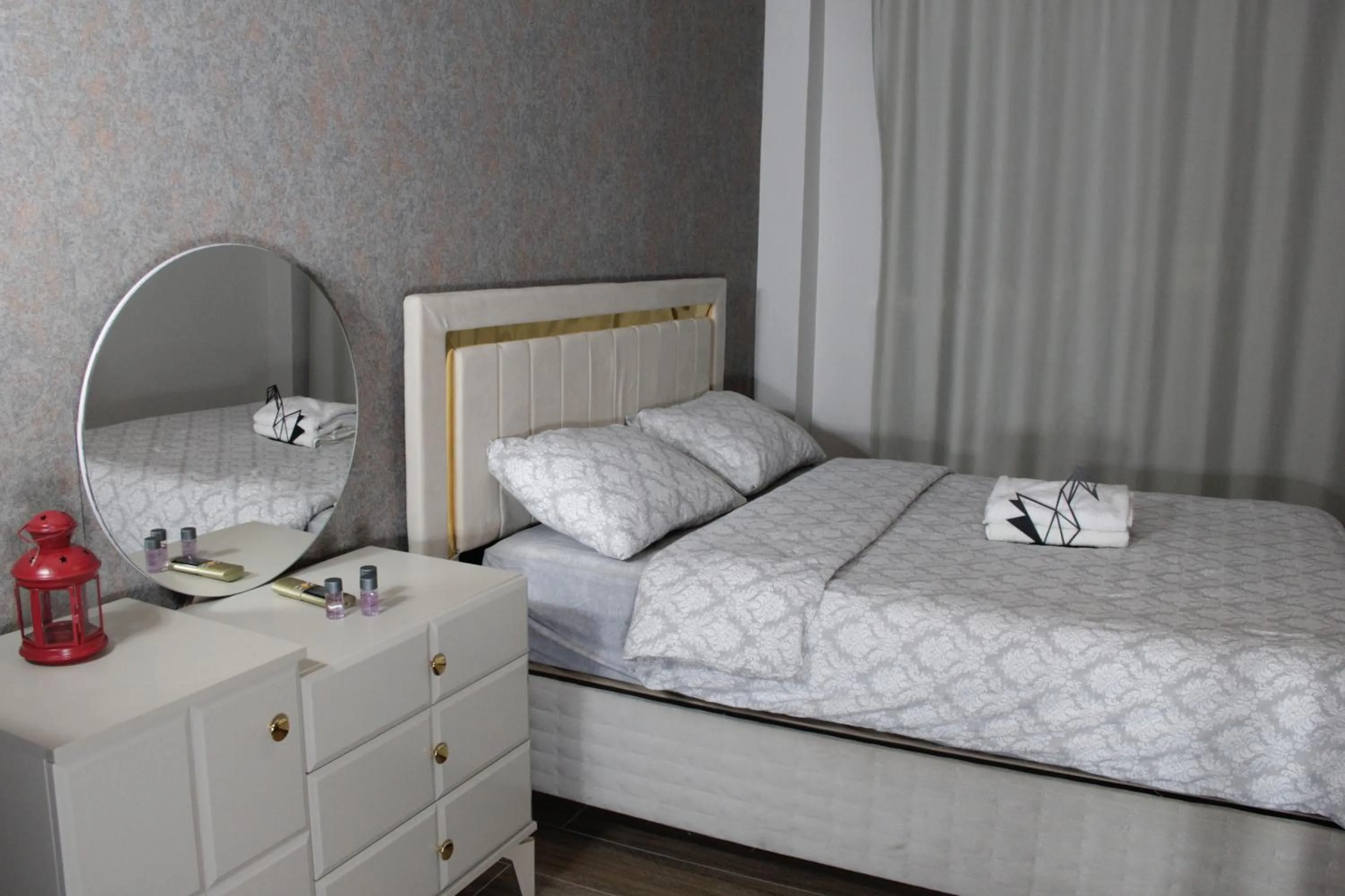 Bed in Solo Suites Hotel