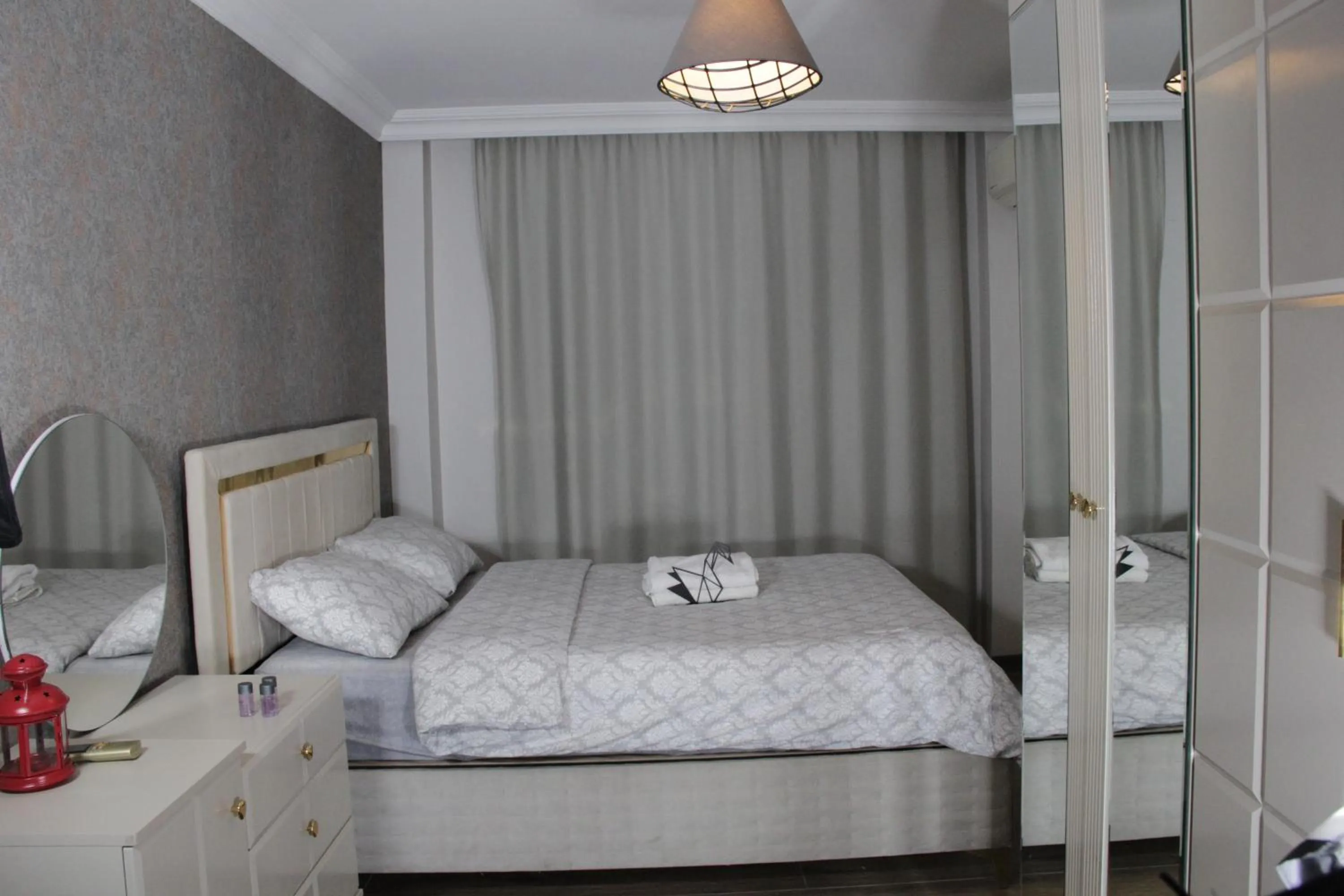 Bed in Solo Suites Hotel