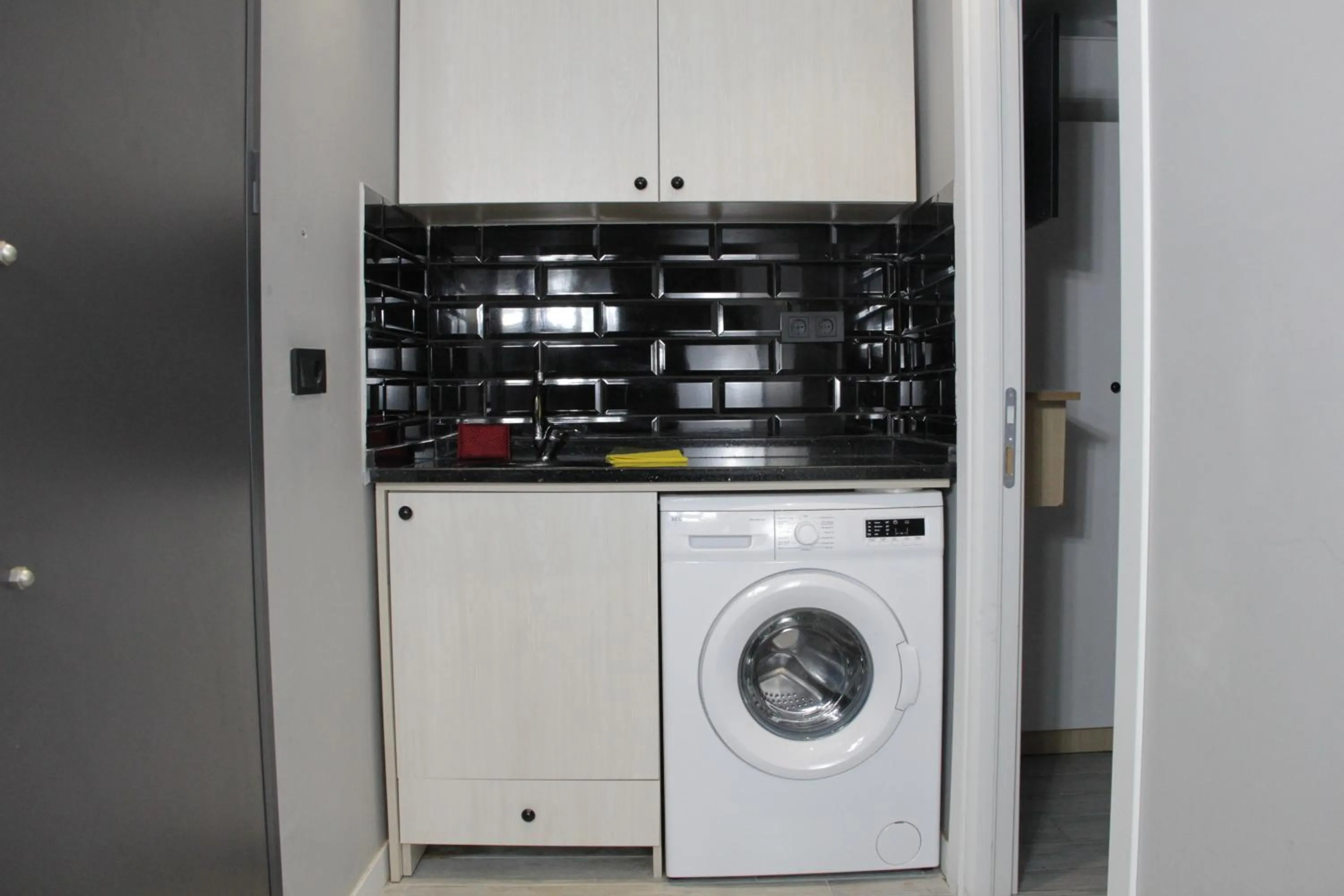 Kitchen or kitchenette in Solo Suites Hotel