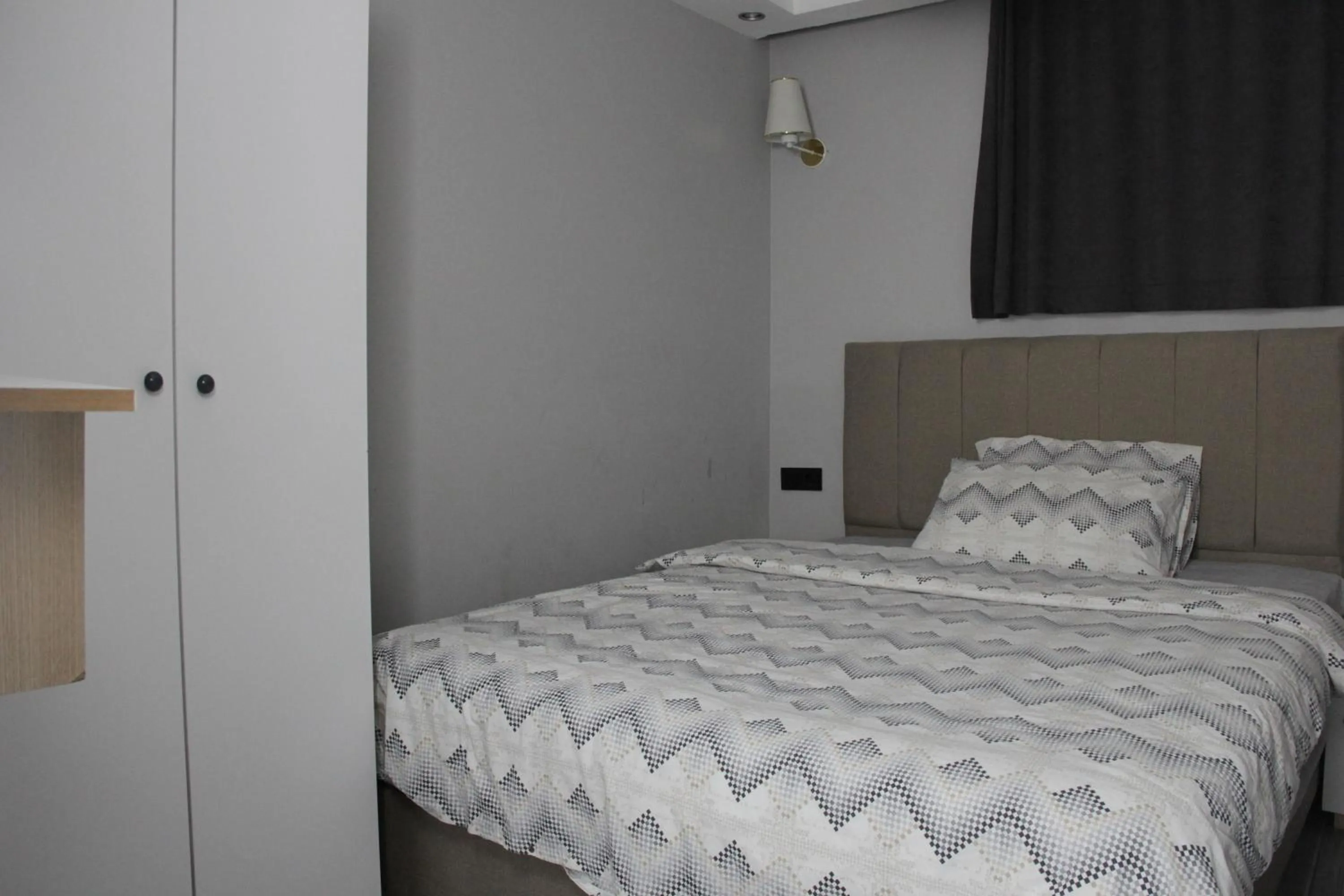 Bed in Solo Suites Hotel