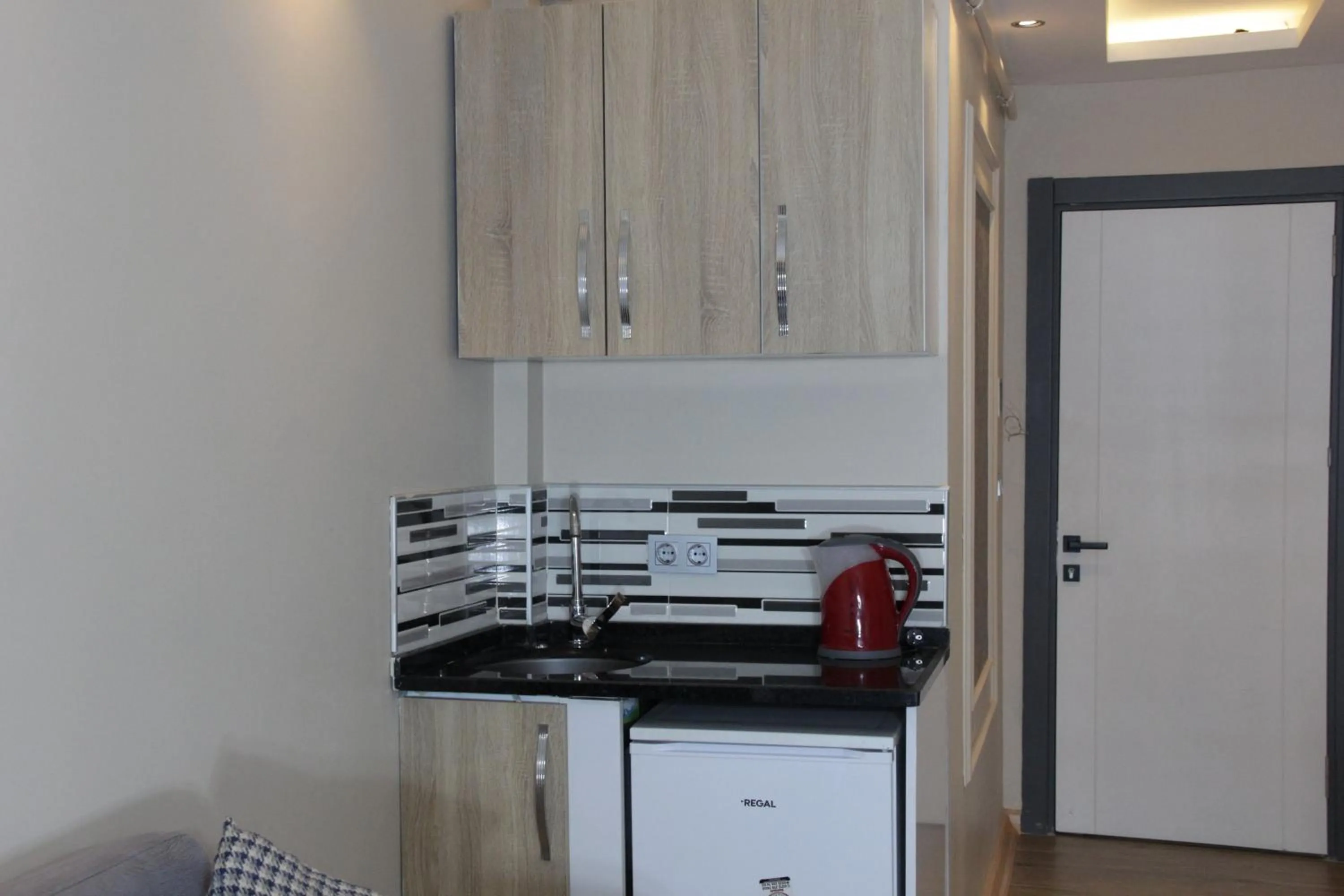 Kitchen or kitchenette in Solo Suites Hotel