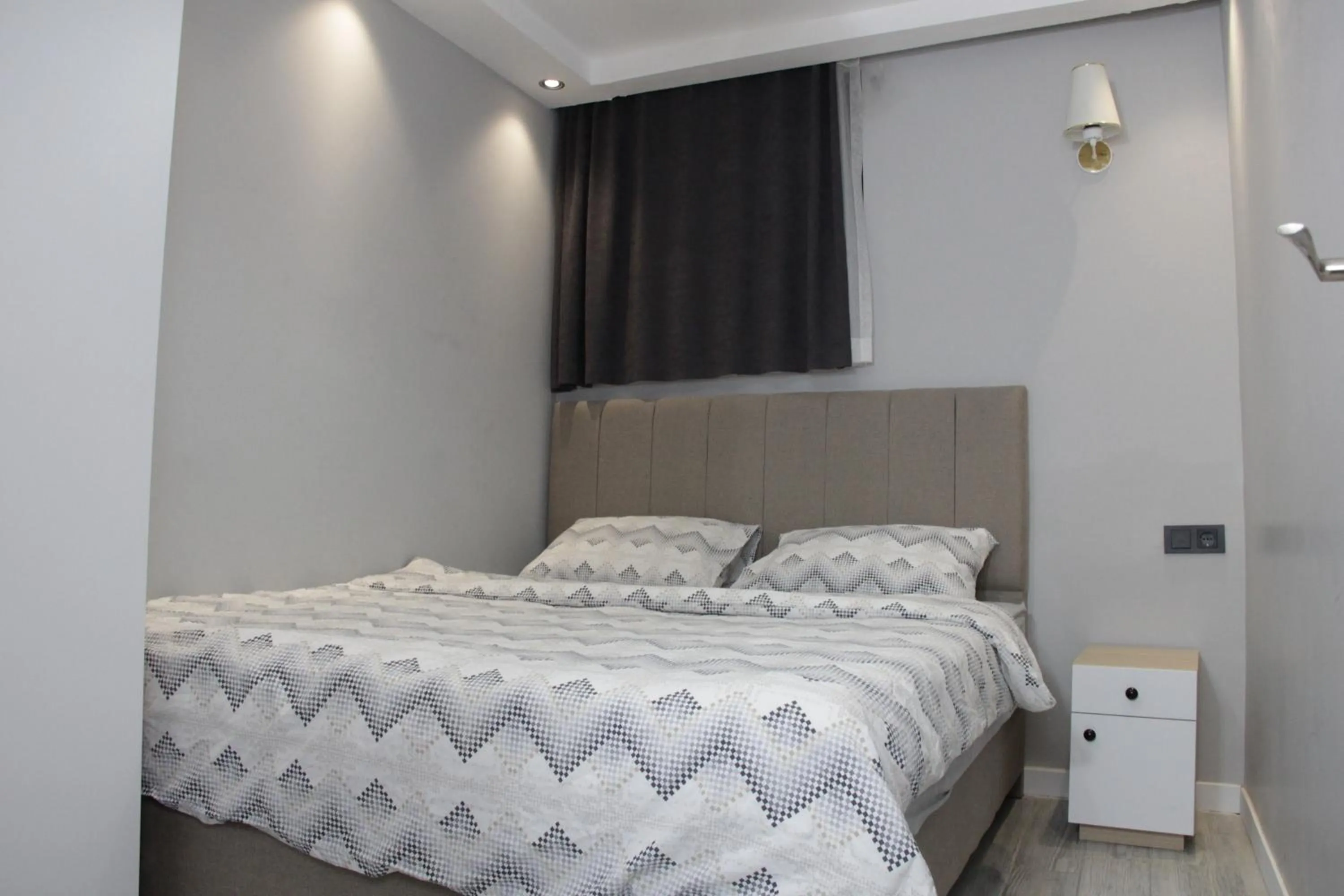 Bed in Solo Suites Hotel