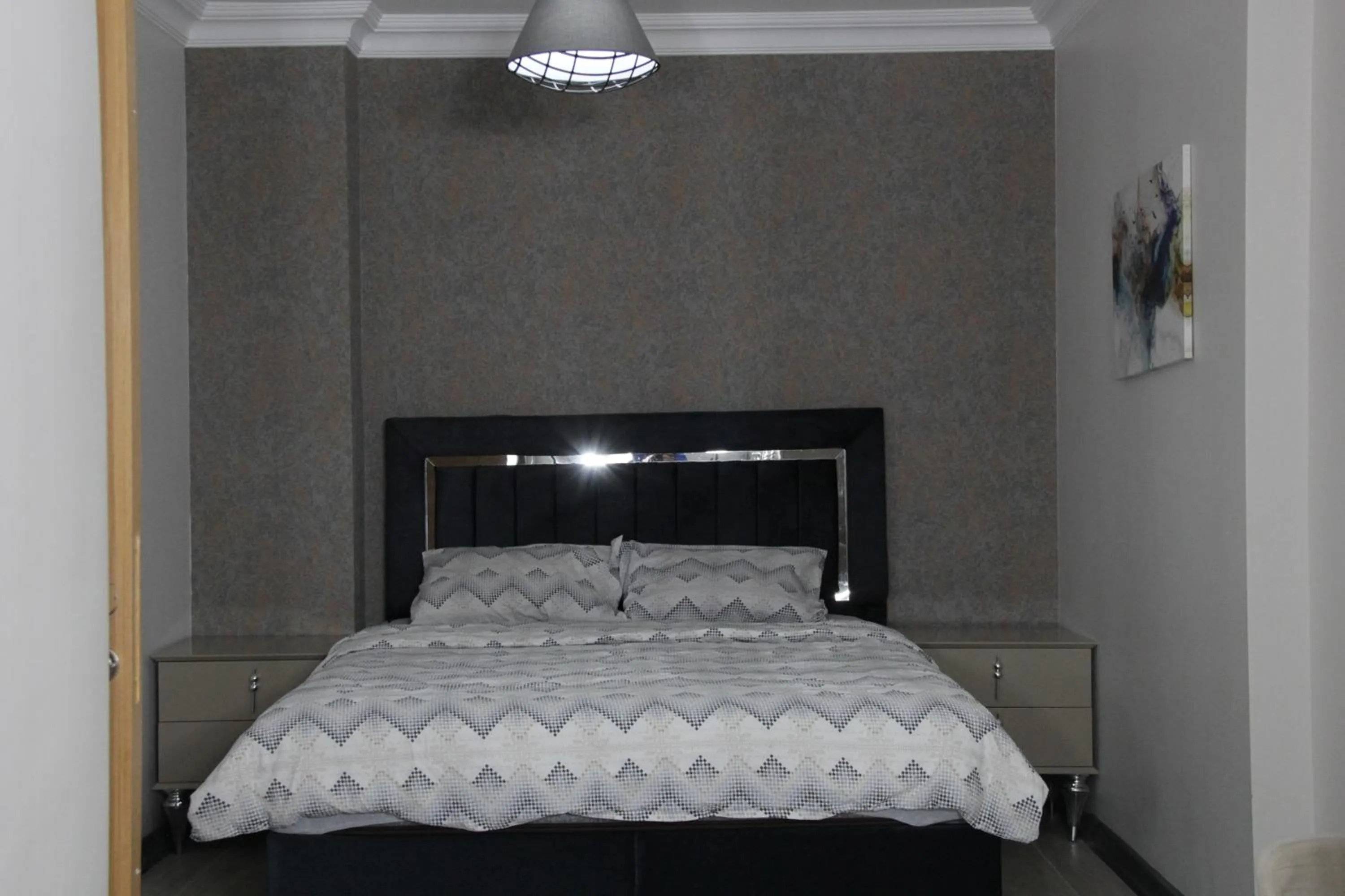 Bed in Solo Suites Hotel