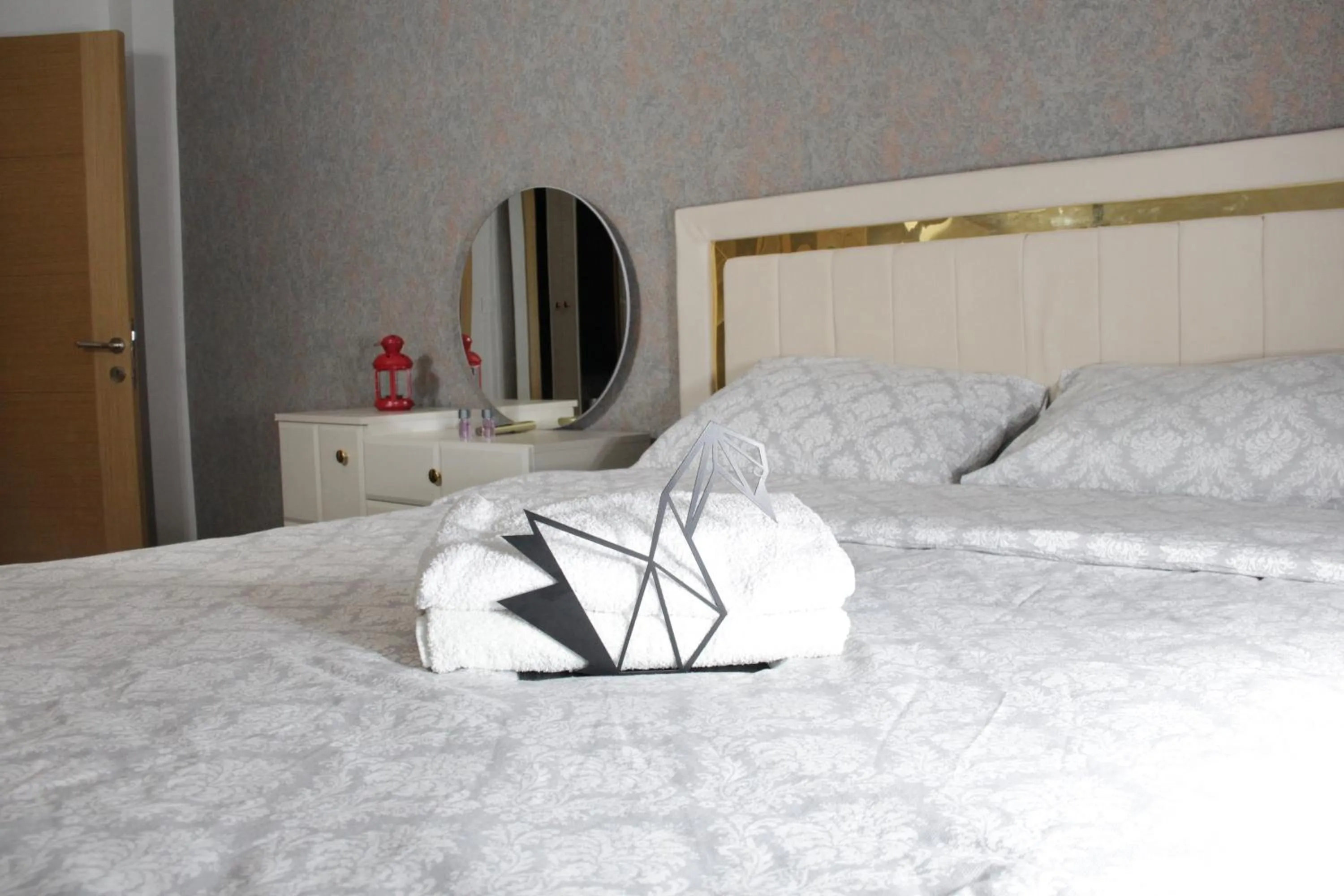Bed in Solo Suites Hotel