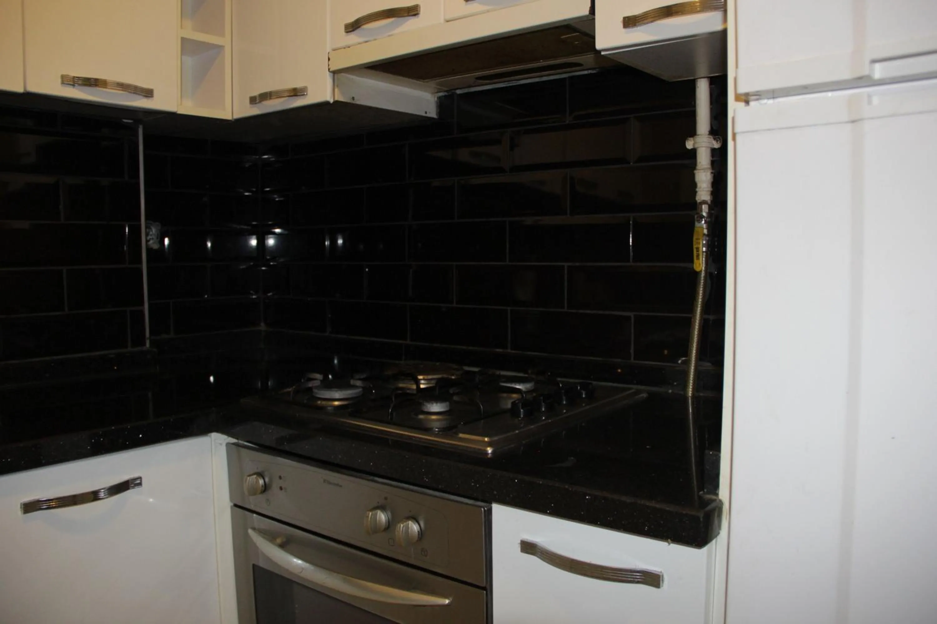 Kitchen or kitchenette in Solo Suites Hotel