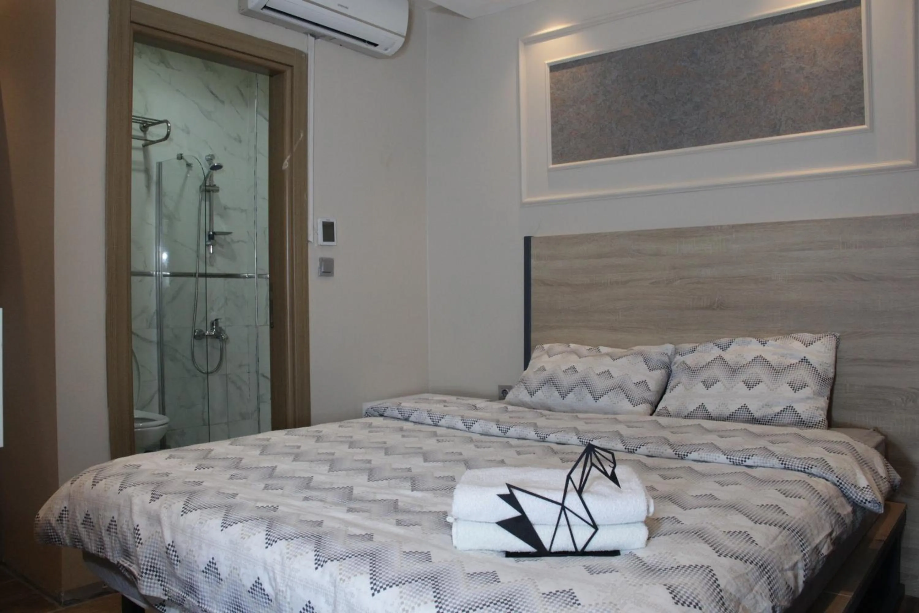 Bed in Solo Suites Hotel