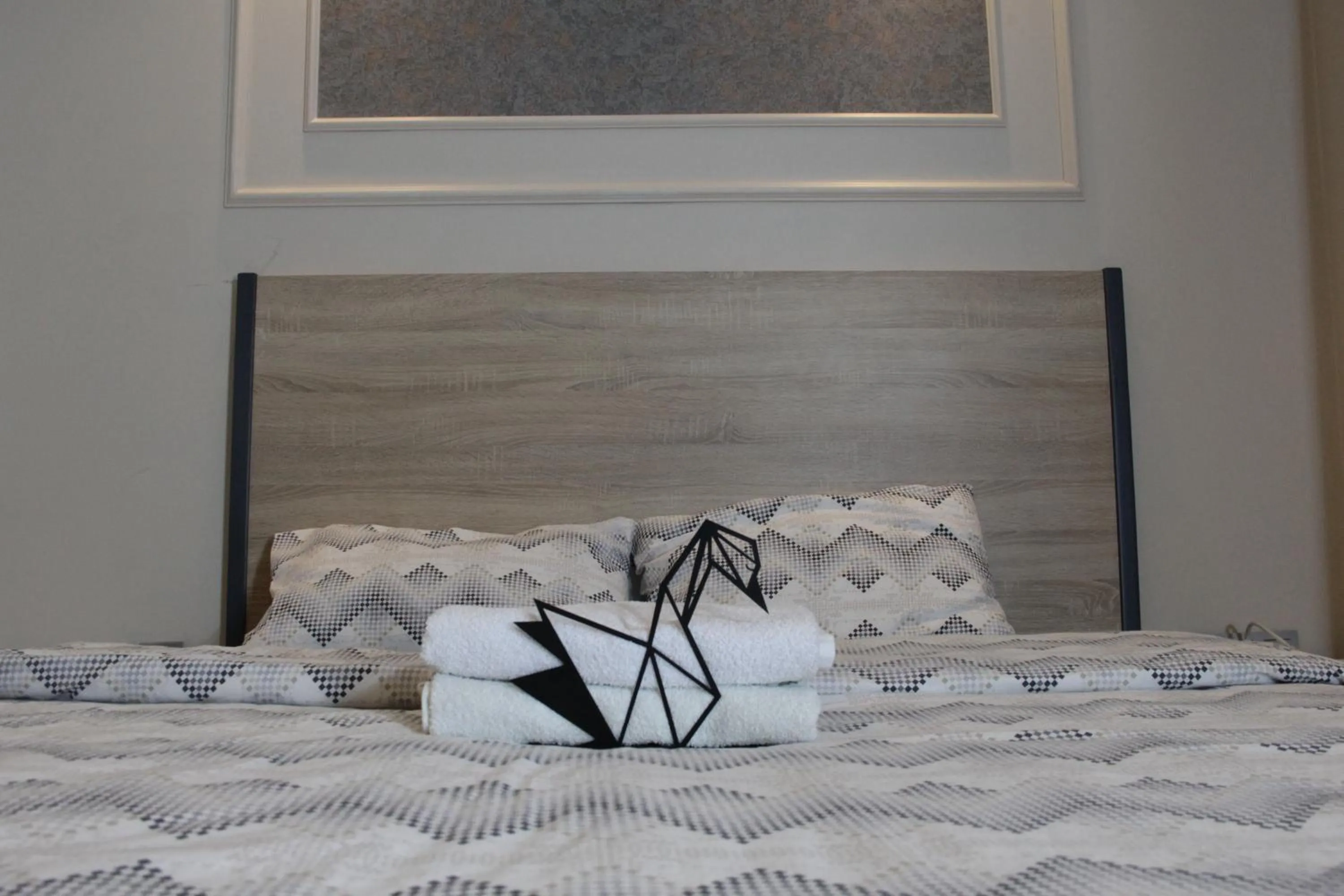 Bed in Solo Suites Hotel