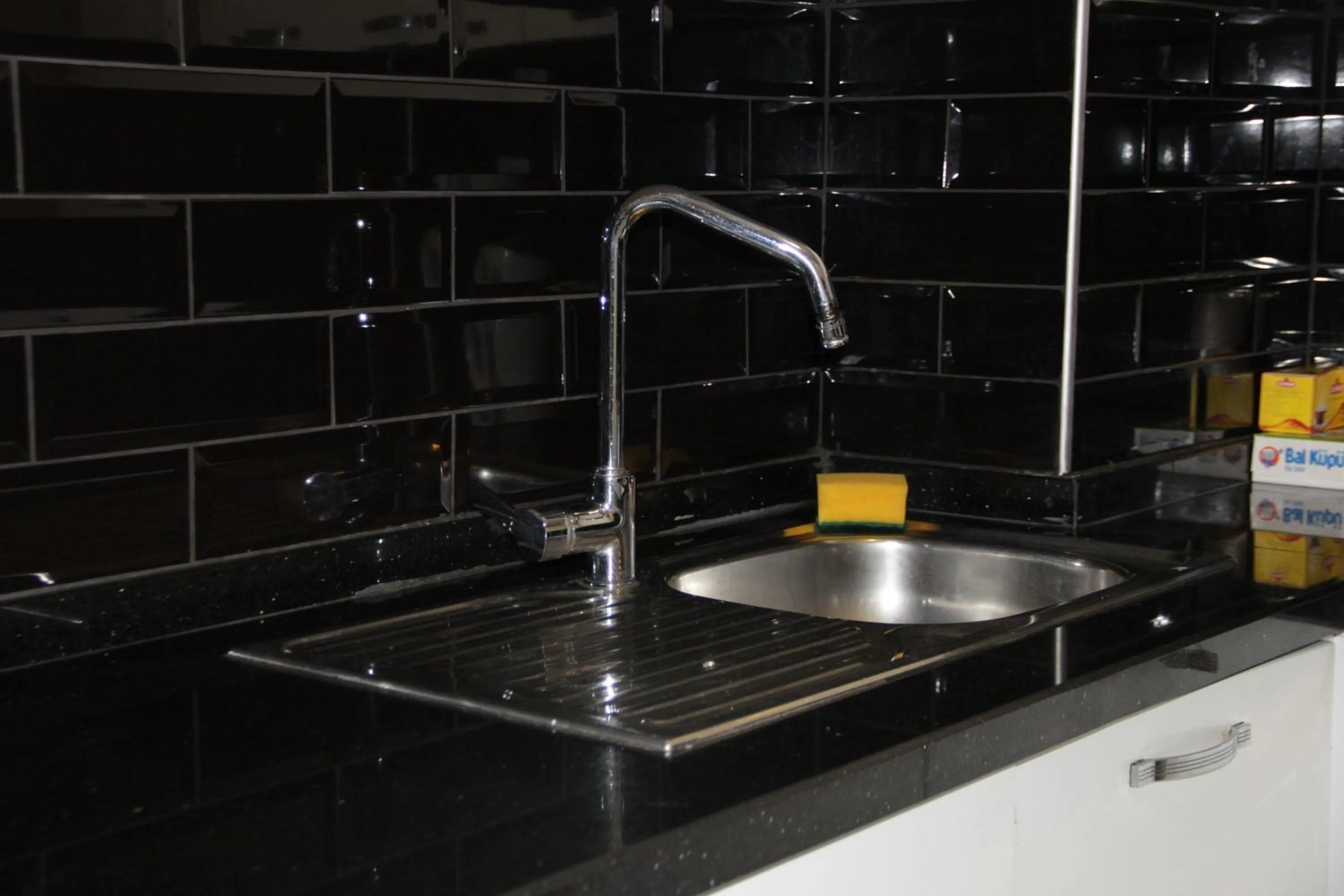 Kitchen or kitchenette in Solo Suites Hotel