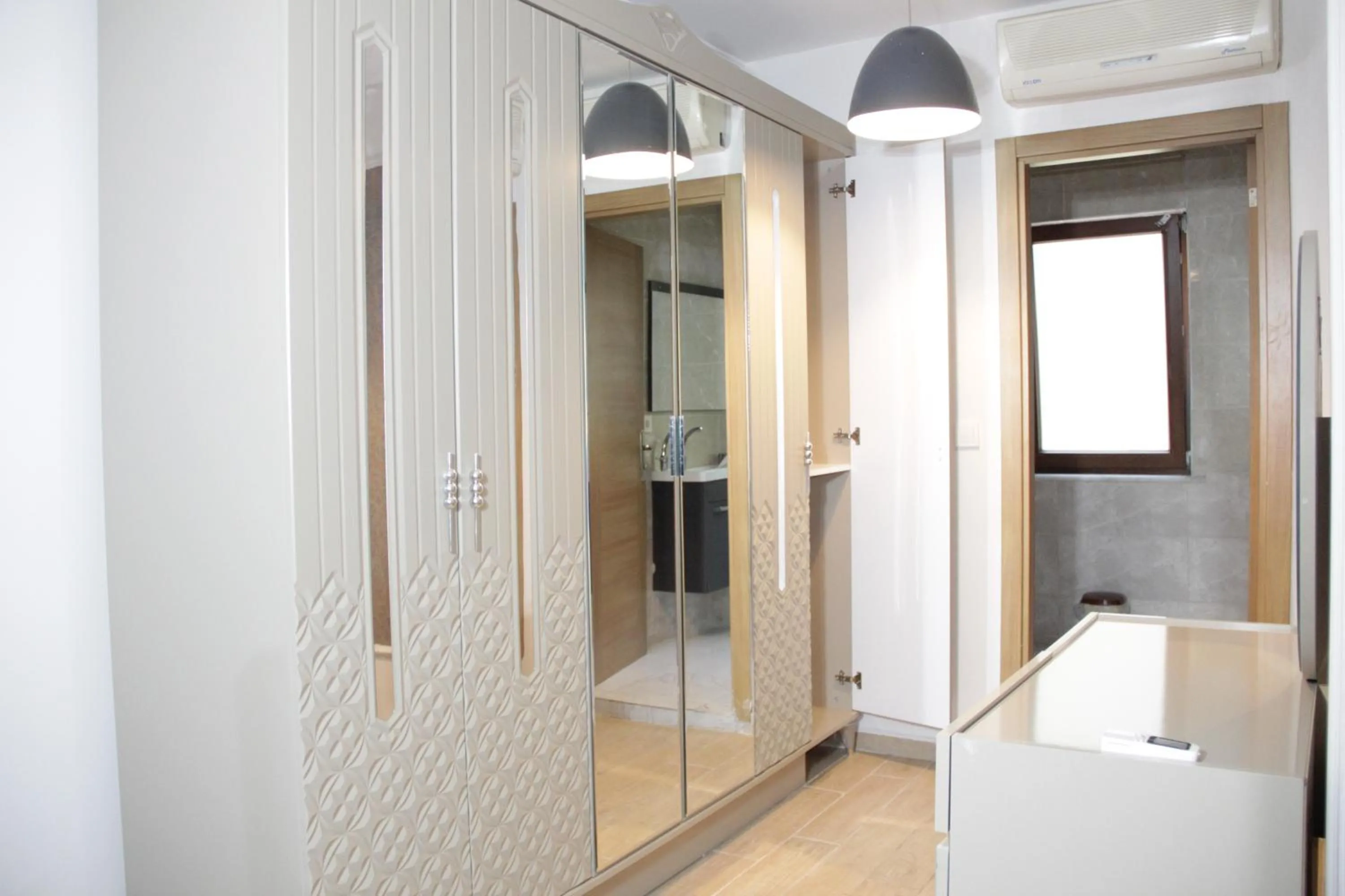 wardrobe in Solo Suites Hotel