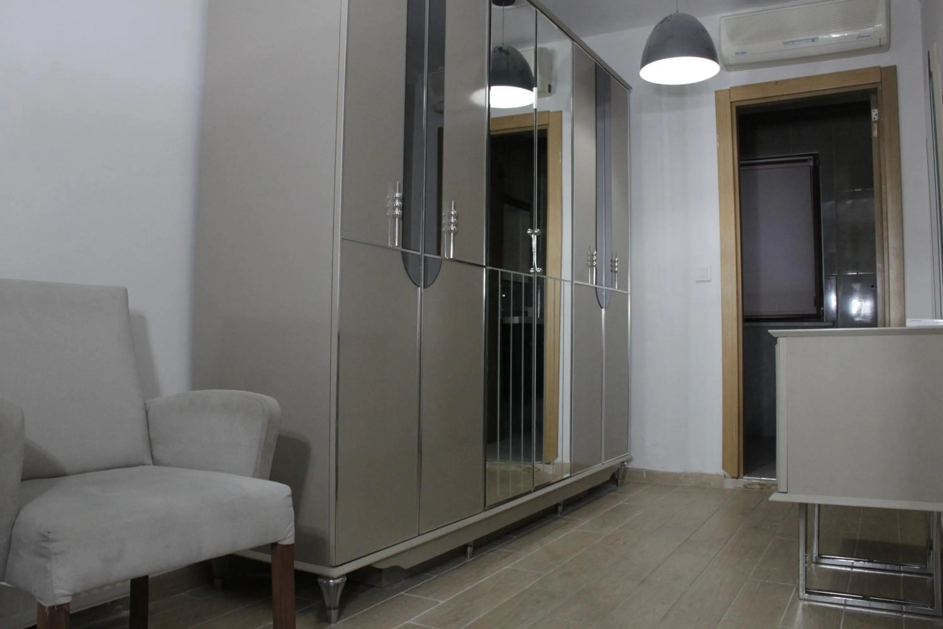 wardrobe in Solo Suites Hotel