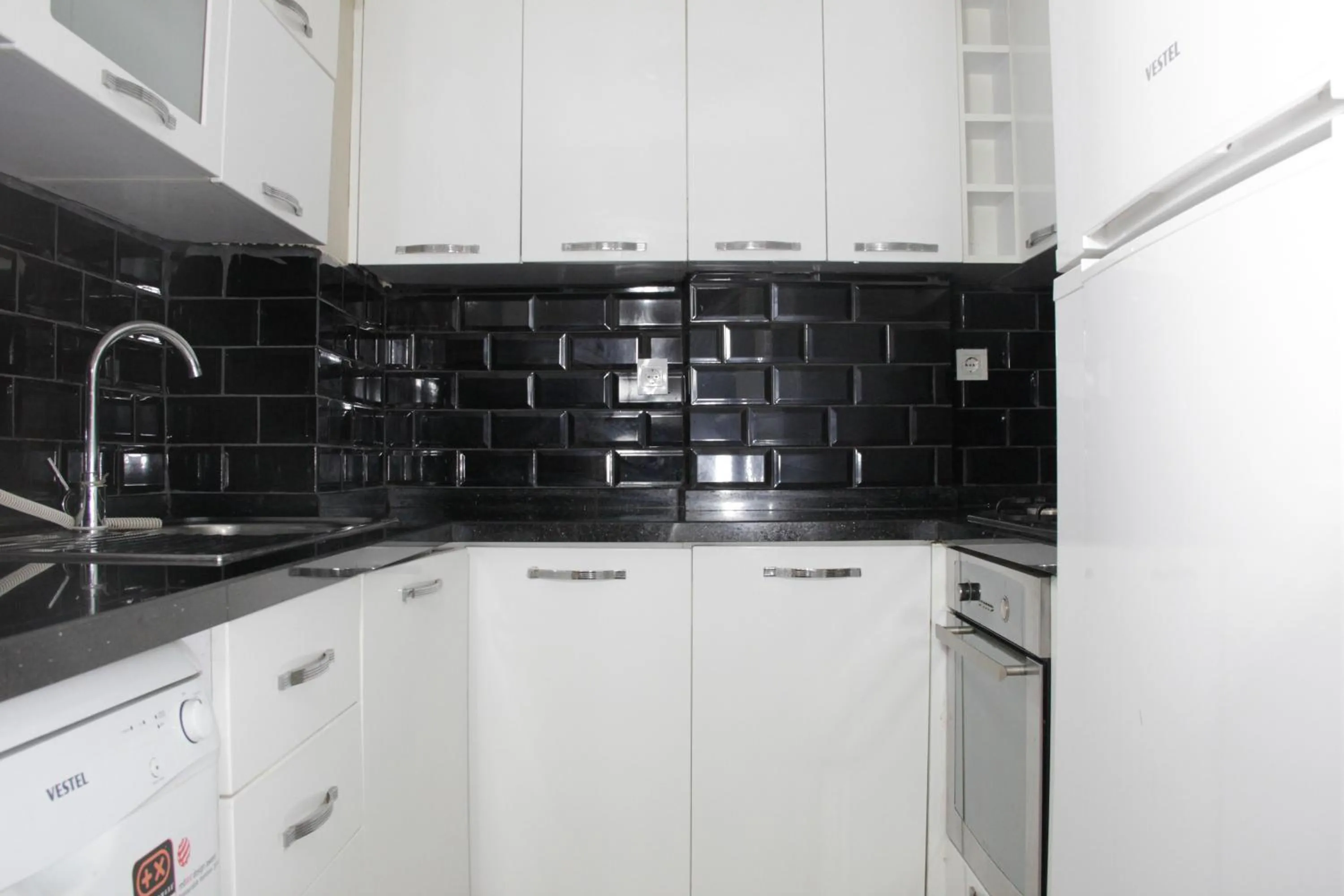 Kitchen or kitchenette in Solo Suites Hotel