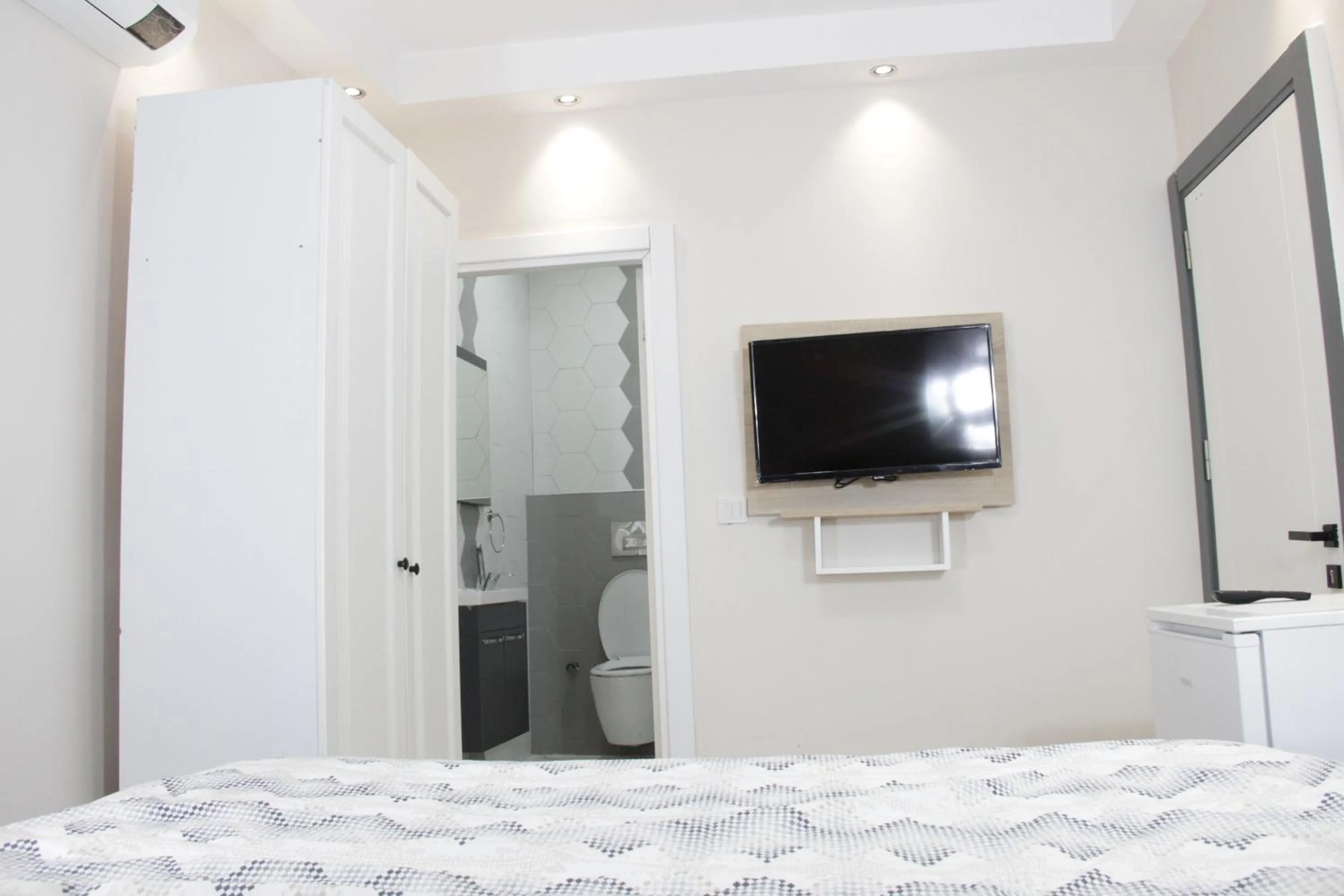 Bed in Solo Suites Hotel