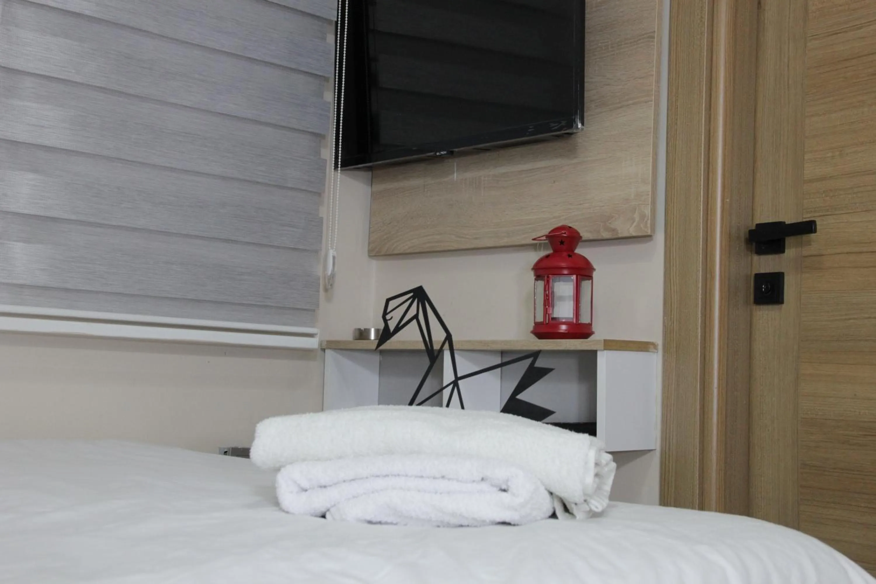 Bed in Solo Suites Hotel