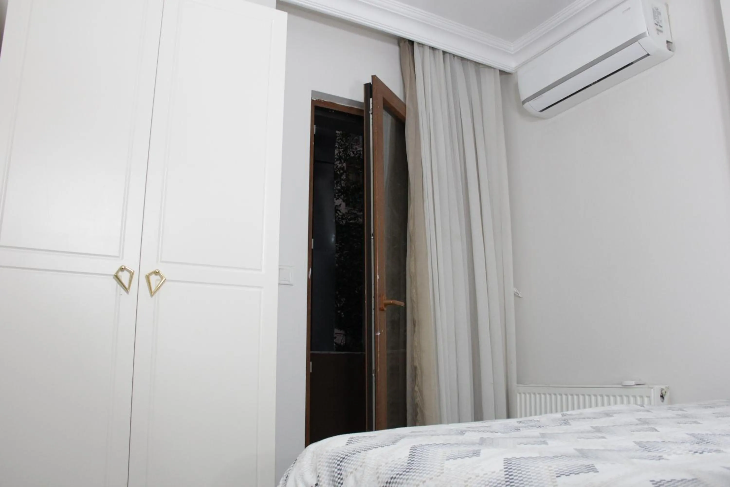 Bed in Solo Suites Hotel
