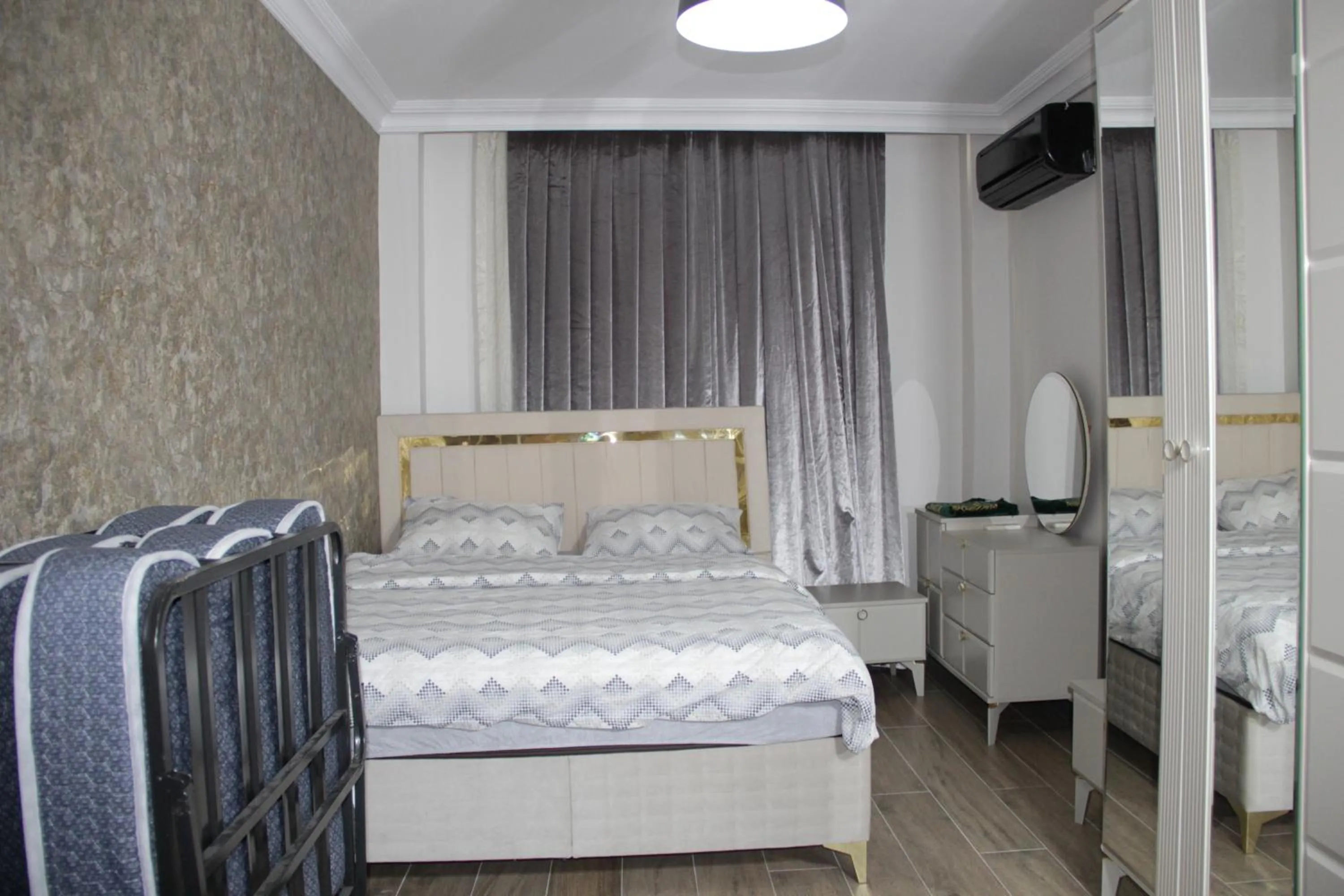 Bed in Solo Suites Hotel