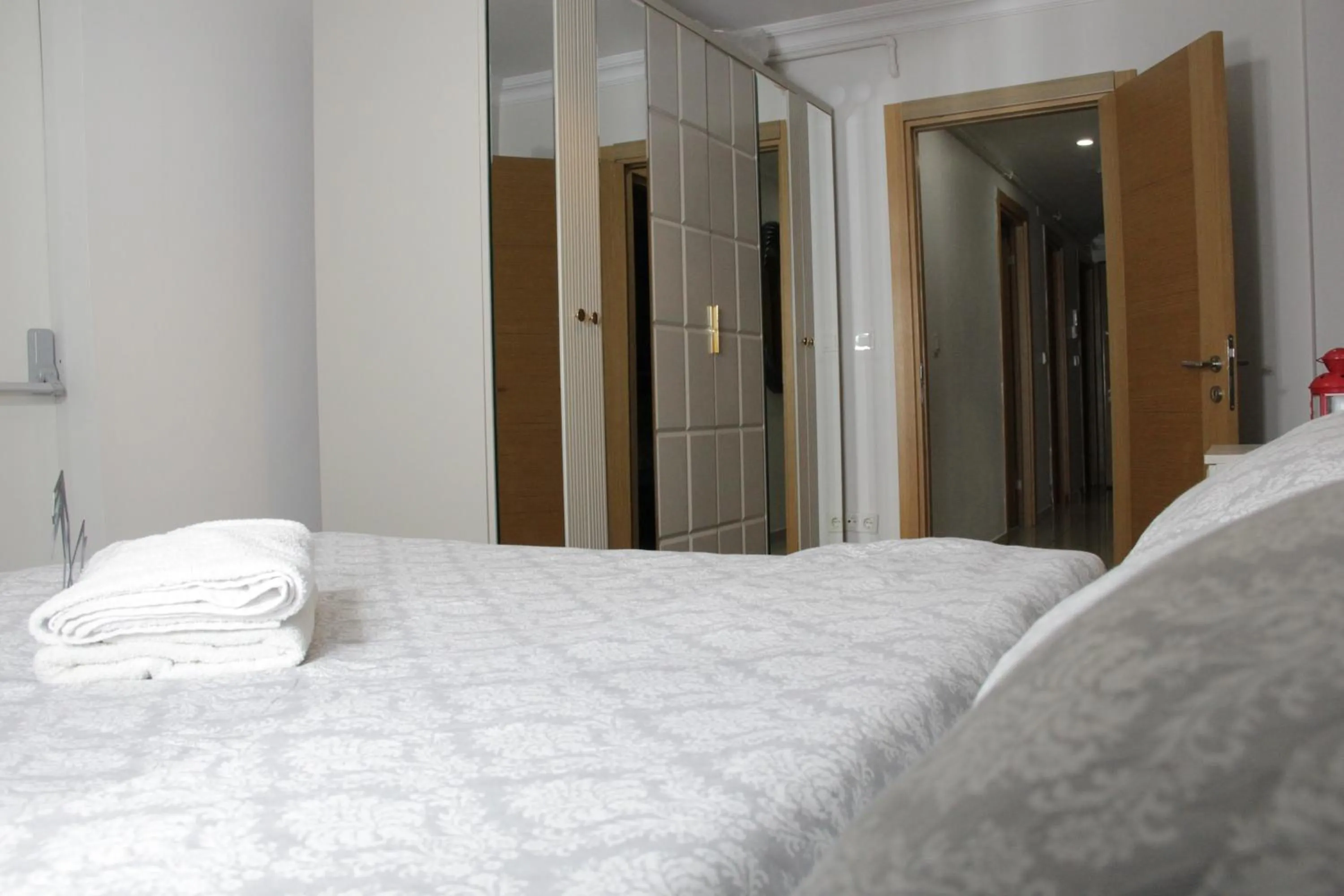 Bed in Solo Suites Hotel