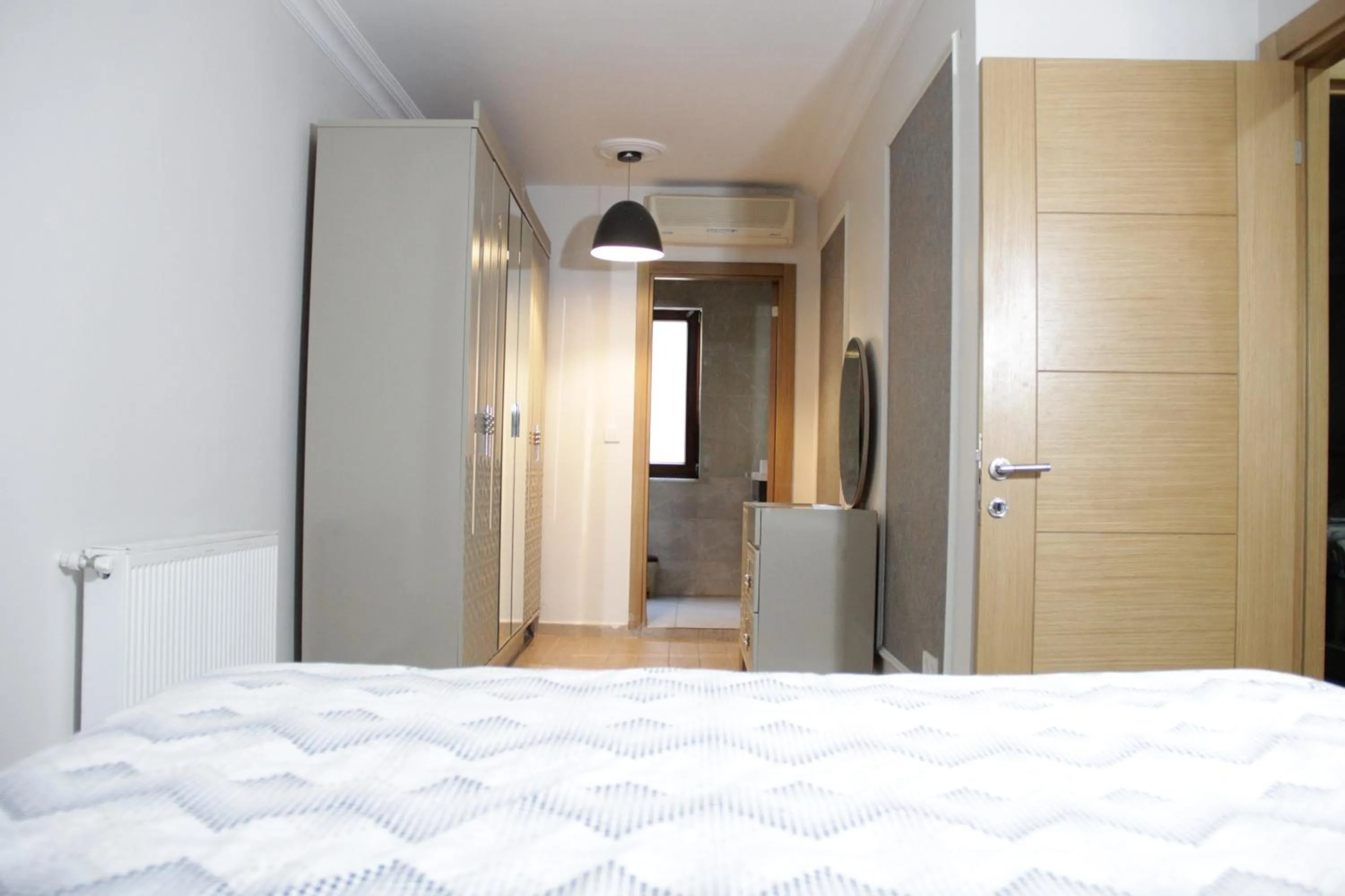 Bed in Solo Suites Hotel
