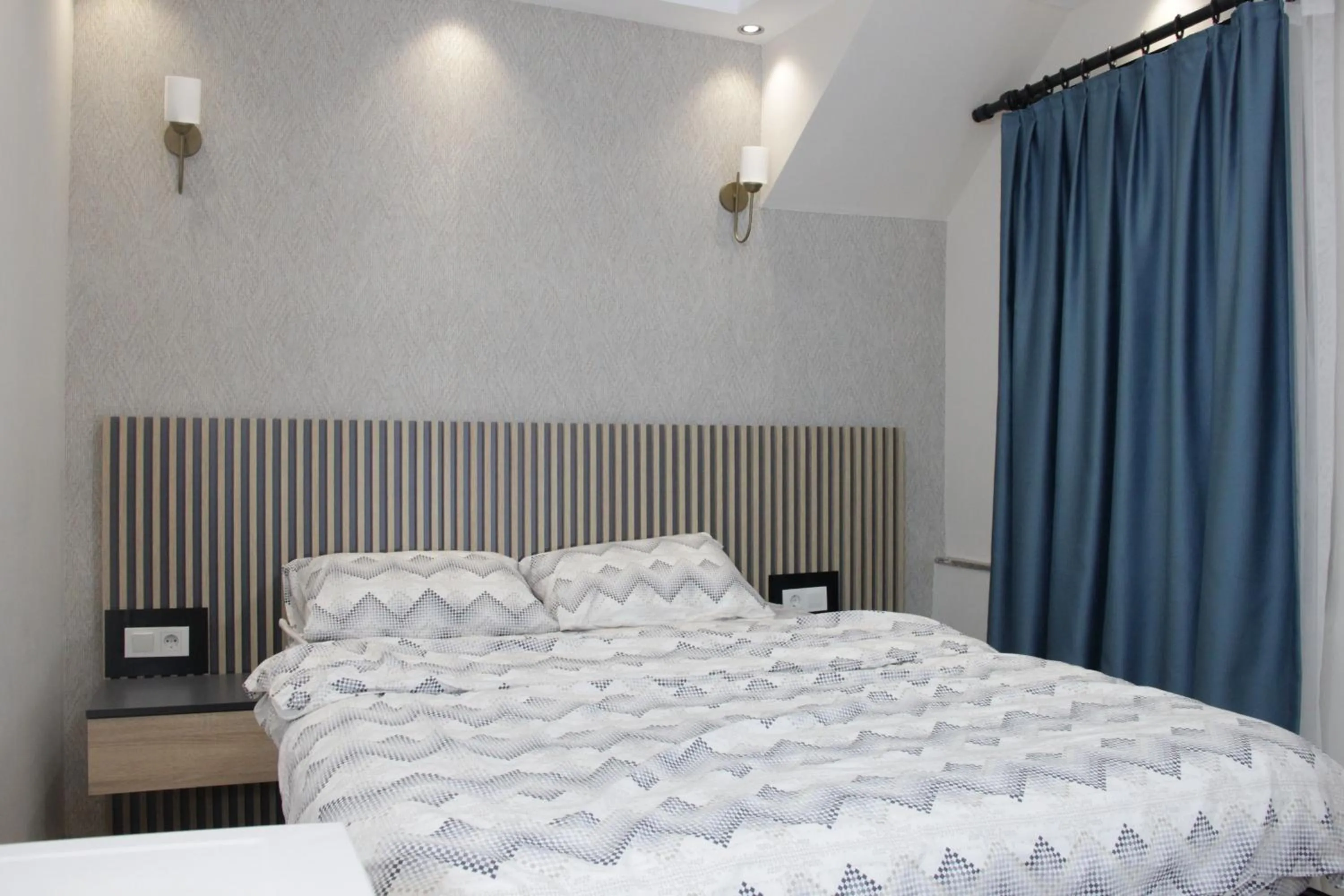 Bed in Solo Suites Hotel