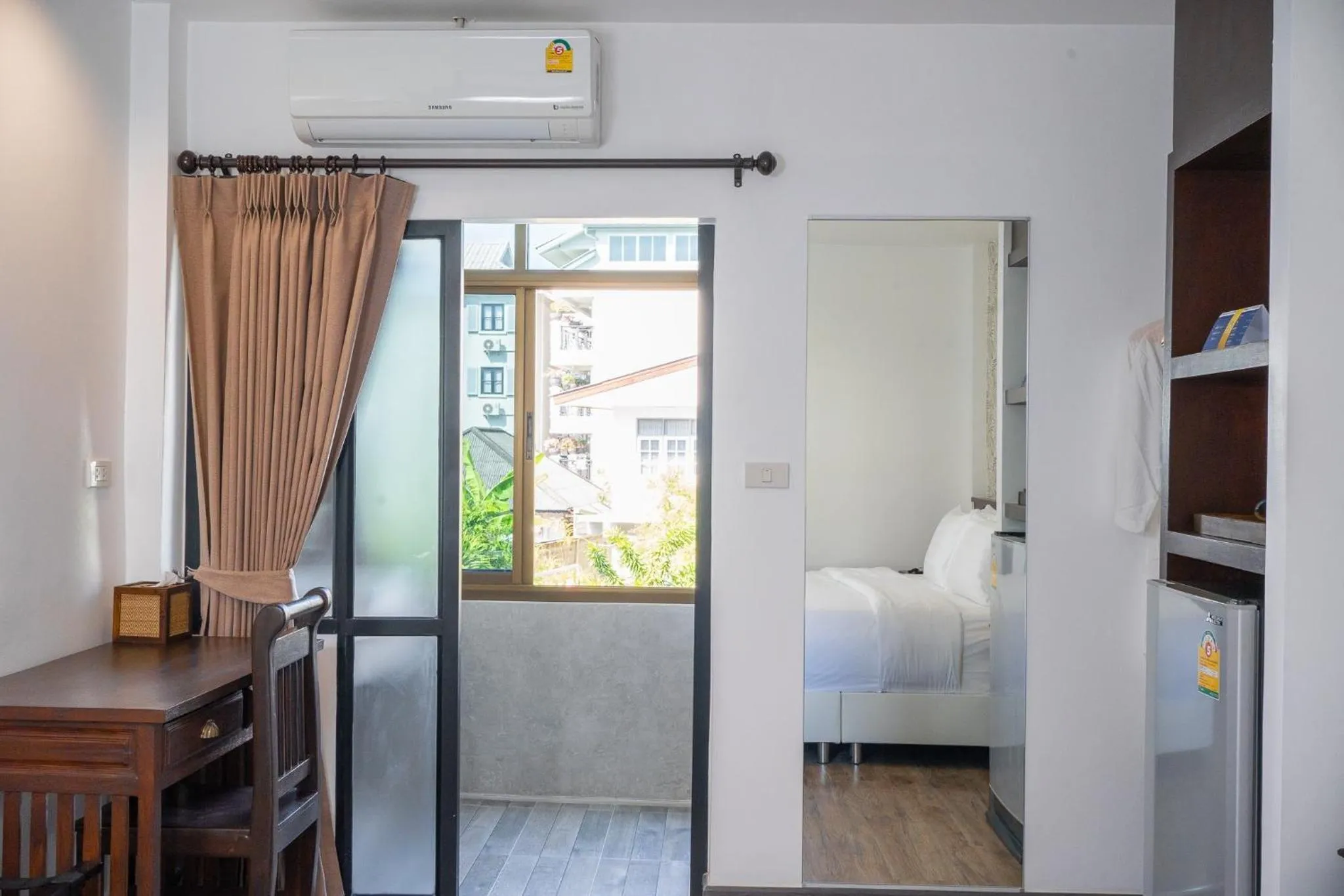 air conditioner, Bed in Singharaj Boutique Hotel