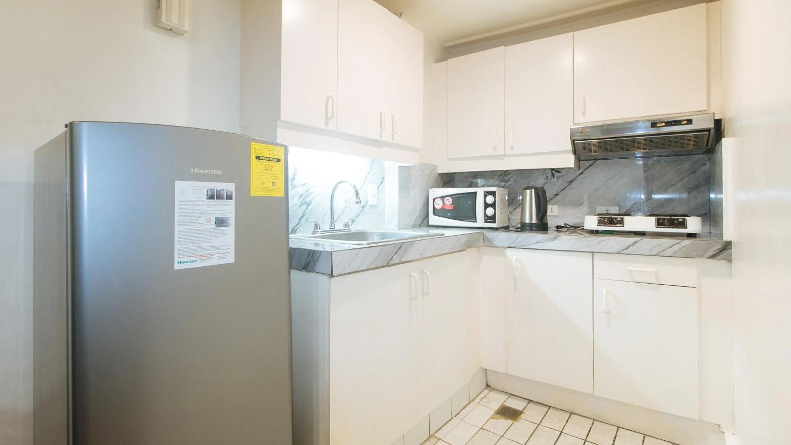Kitchen or kitchenette in Sunette Tower Makati