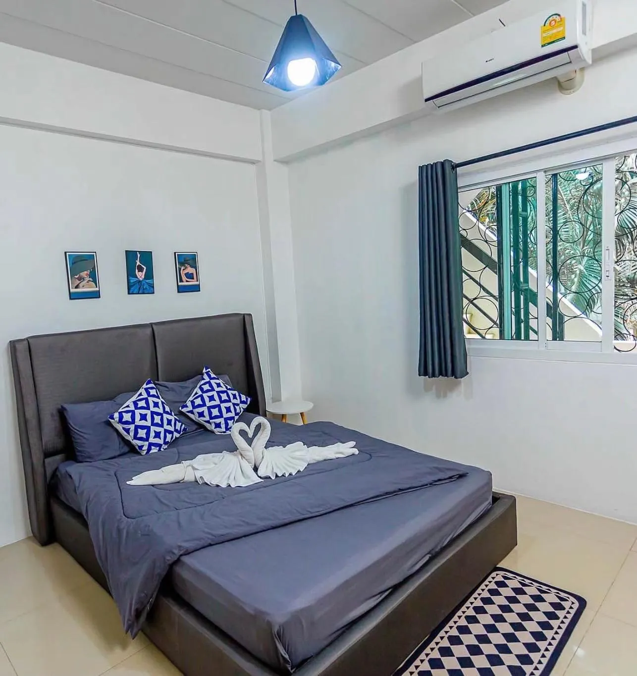 Bed in The Sunset Bangsaen Hotel