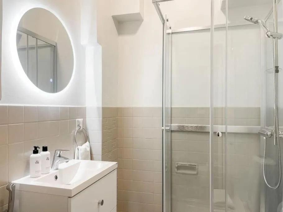 Bathroom in Central 1BR next to the park