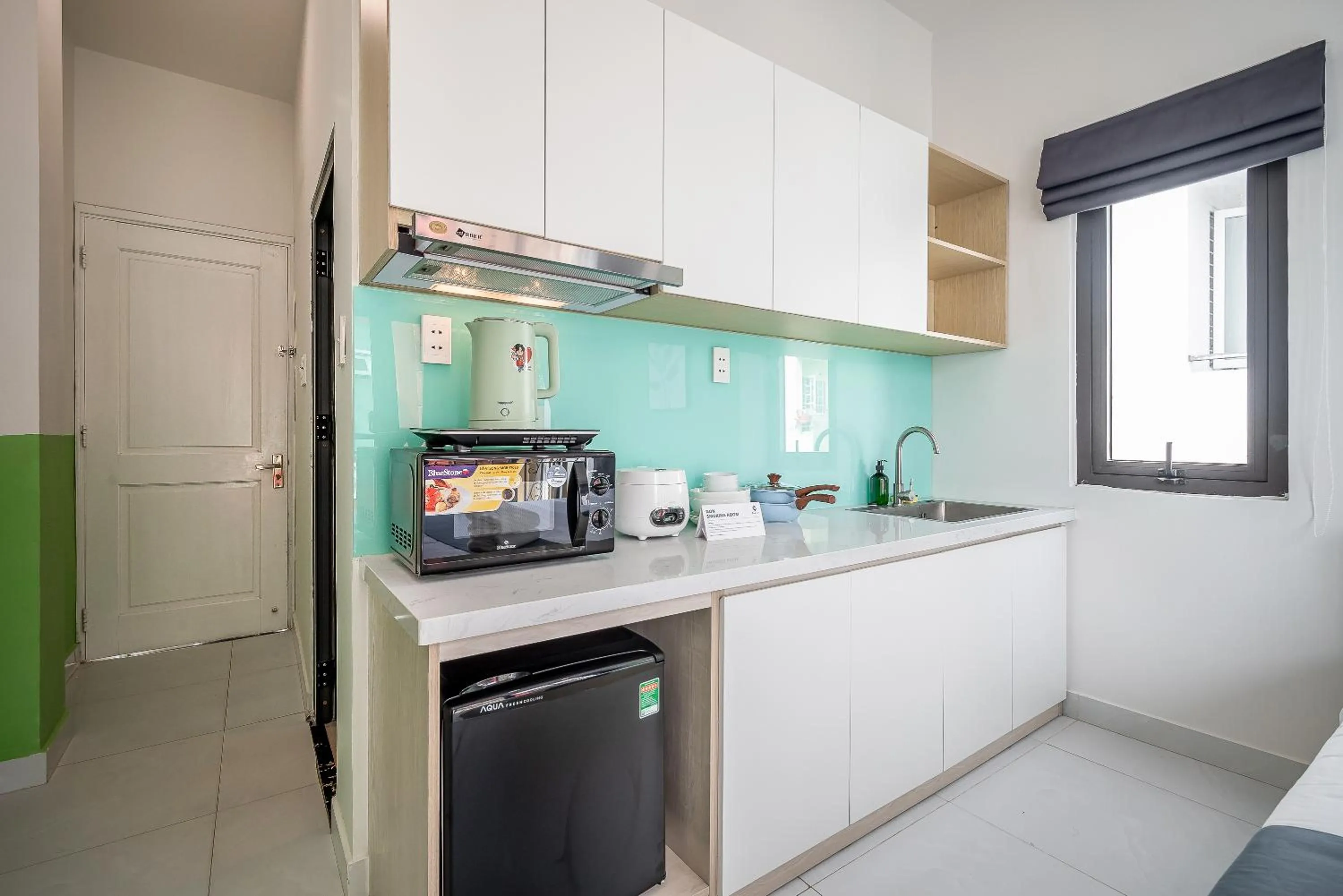 Kitchen or kitchenette in Cozrum Homes - Coraline House