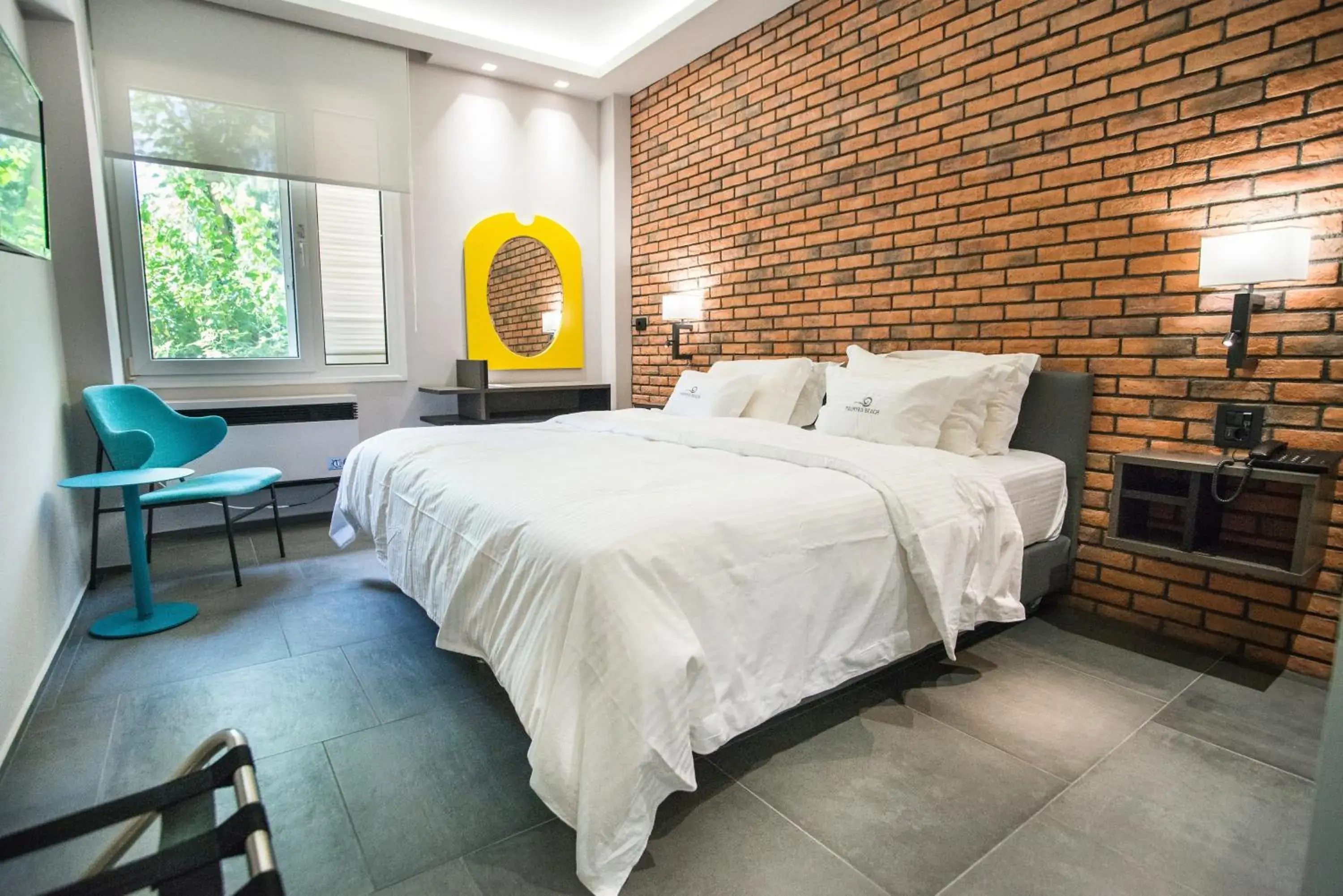 Bed in Palmyra Beach Hotel Bed in Palmyra Beach Hotel