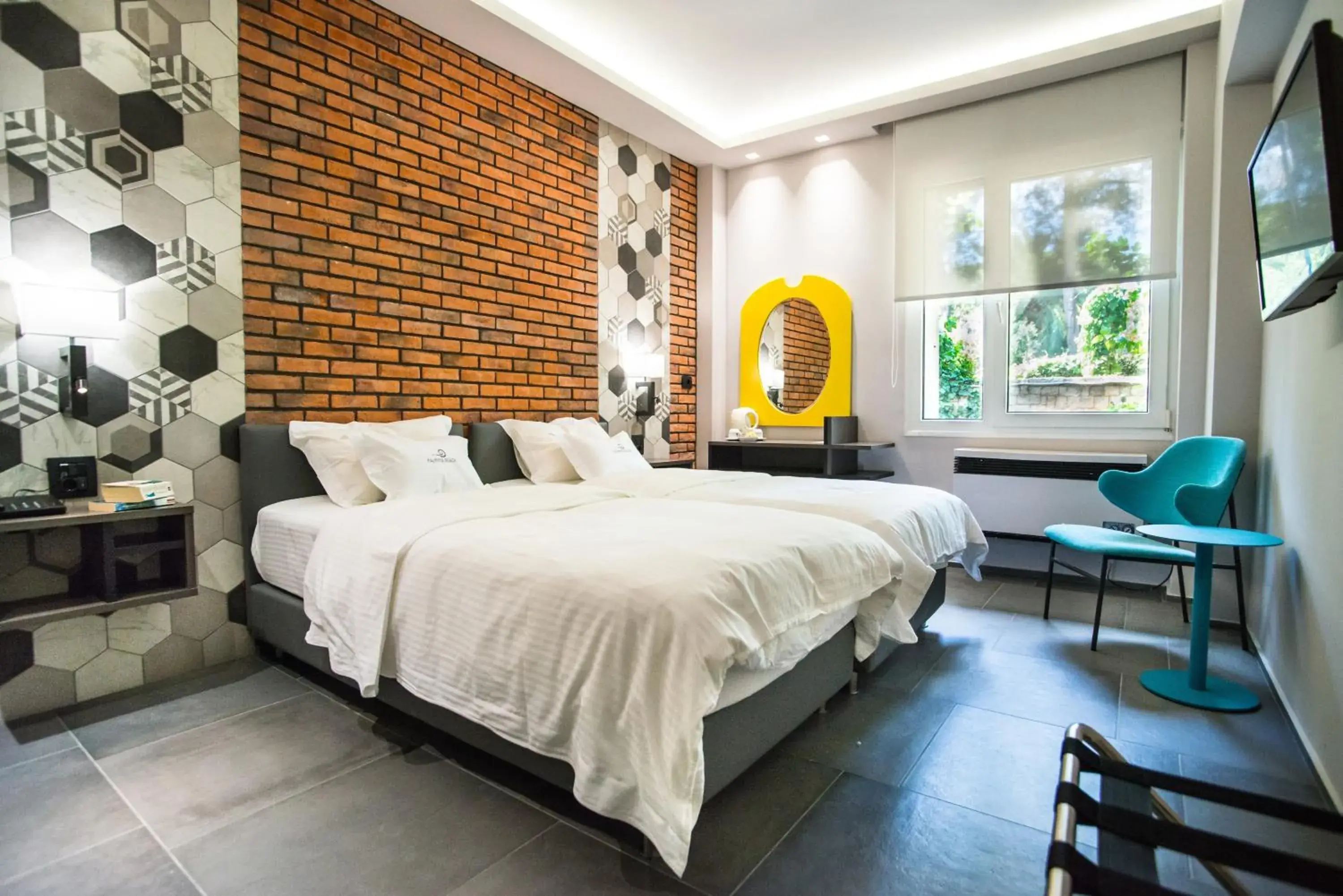 Bed in Palmyra Beach Hotel Bed in Palmyra Beach Hotel