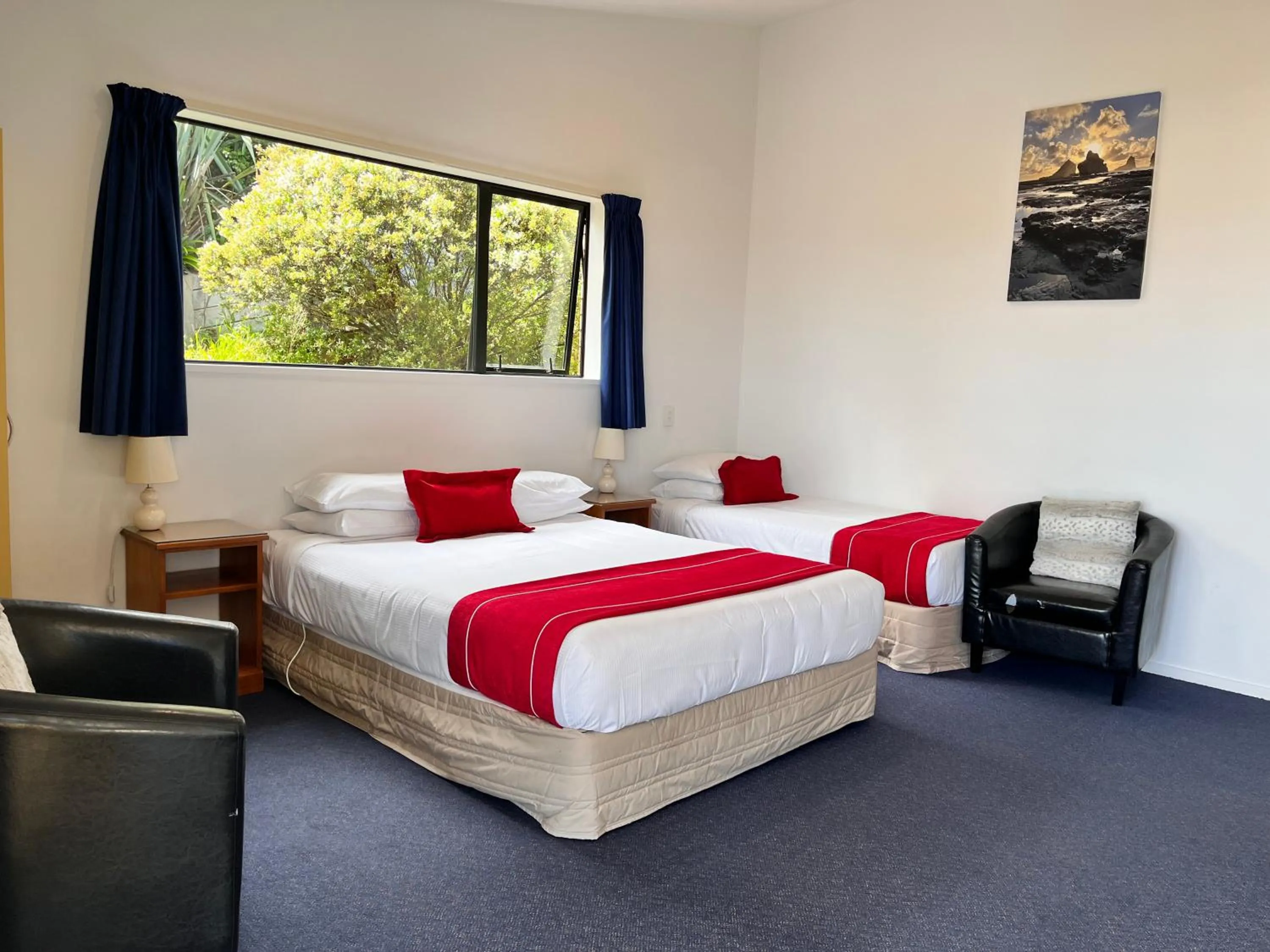 Bed in Sundowner Motel