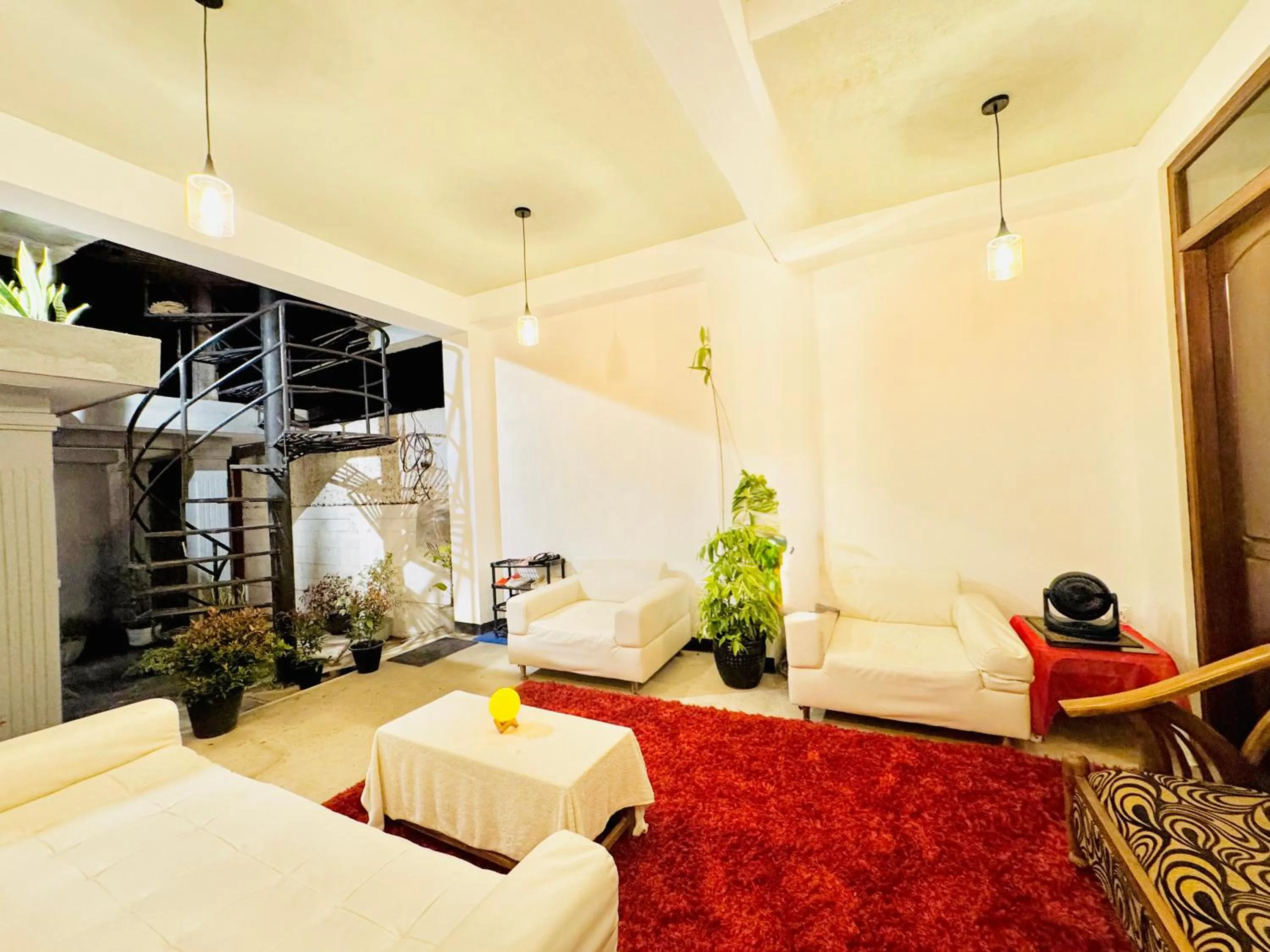 Seating area, Bed in Sea Breeze Guest House Negombo